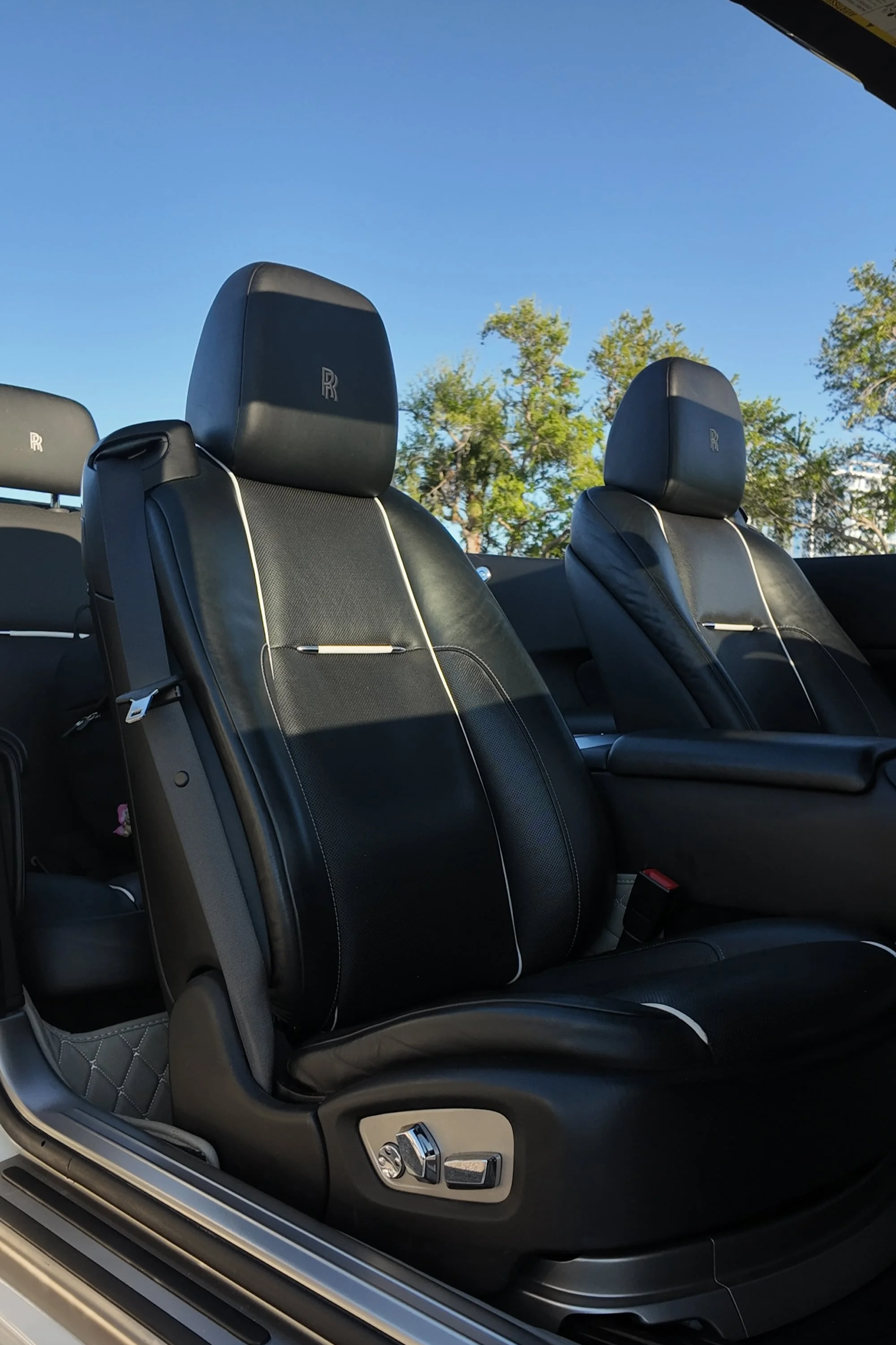 Luxury leather seats inside Rolls-Royce Dawn convertible interior