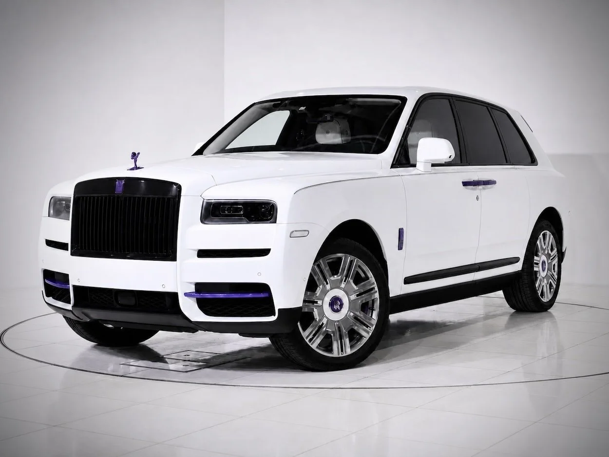 Rolls-Royce Cullinan luxury SUV with custom purple accents for rent in Tampa