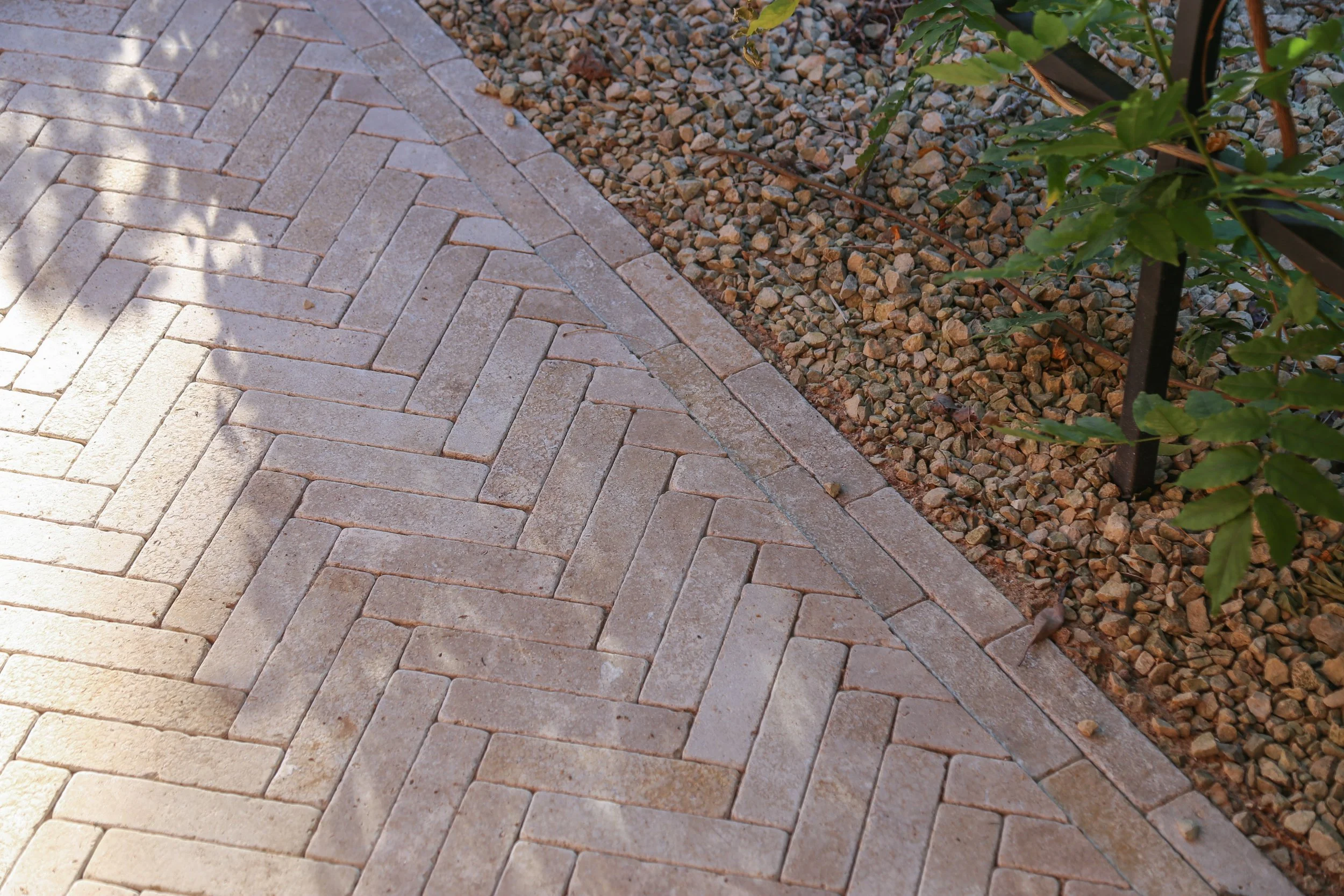 Natural stone brick paver pathway creating a luxury feel to this garden