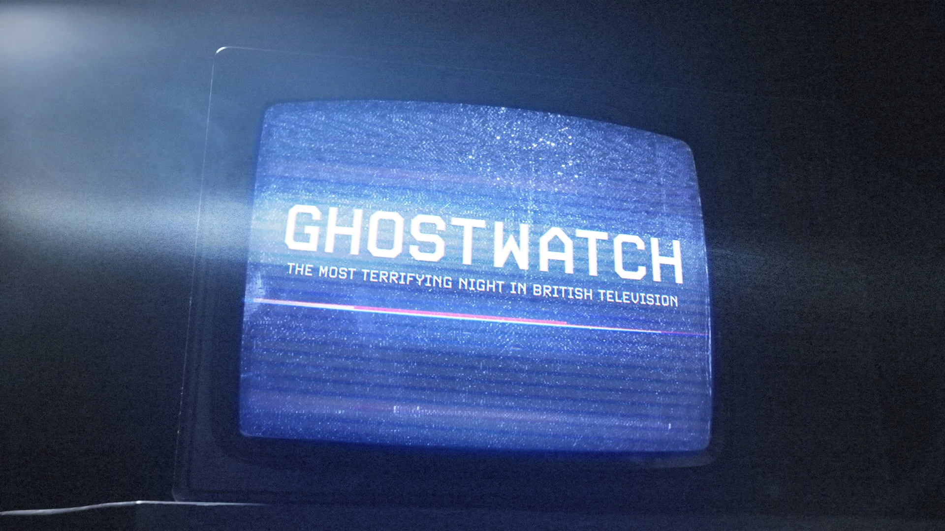 A television screen displaying the title 'GHOSTWATCH' with the subtitle 'The most terrifying night in British television' against a blue starry background.