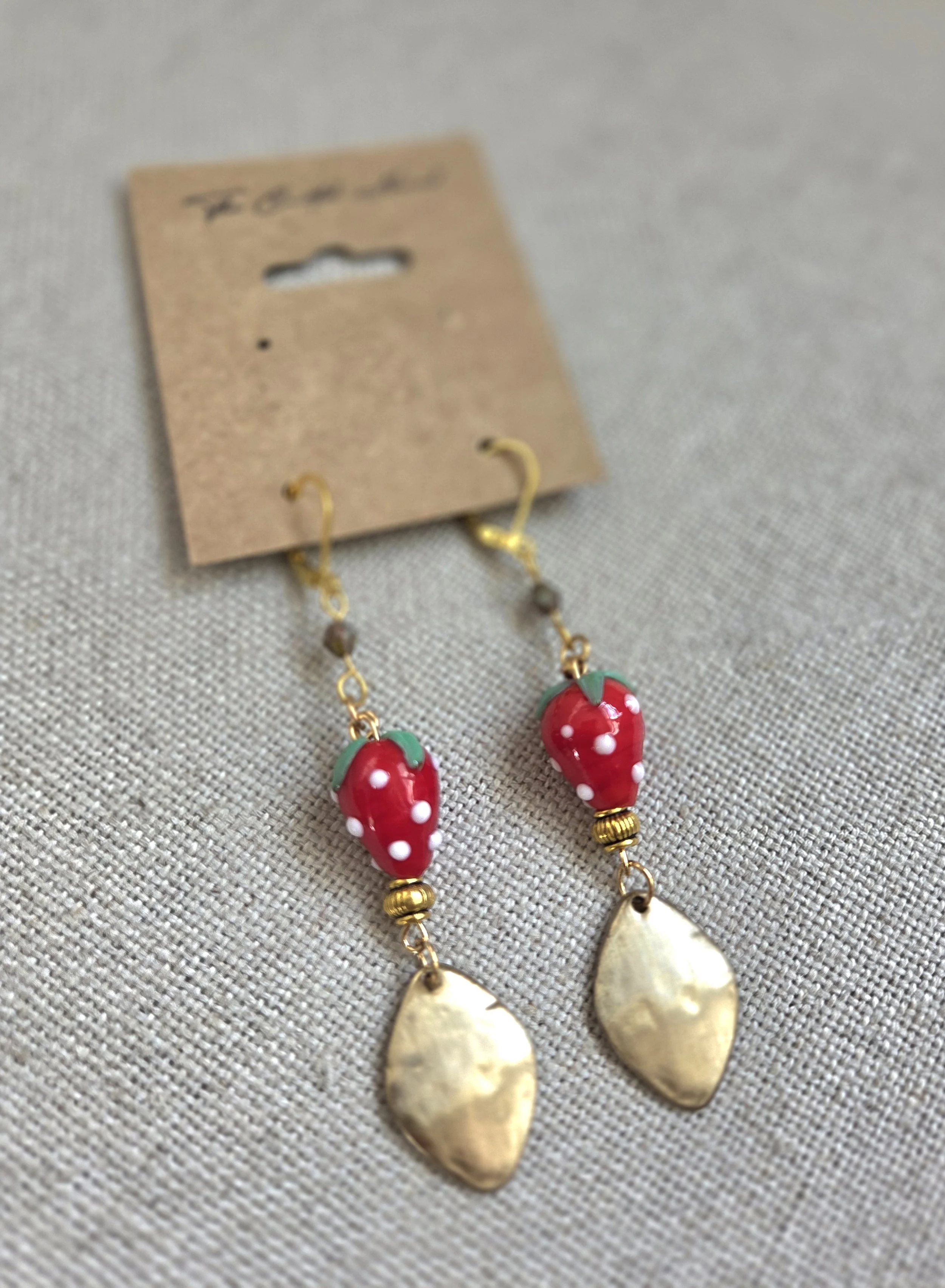 Vintage plate with glass strawberry