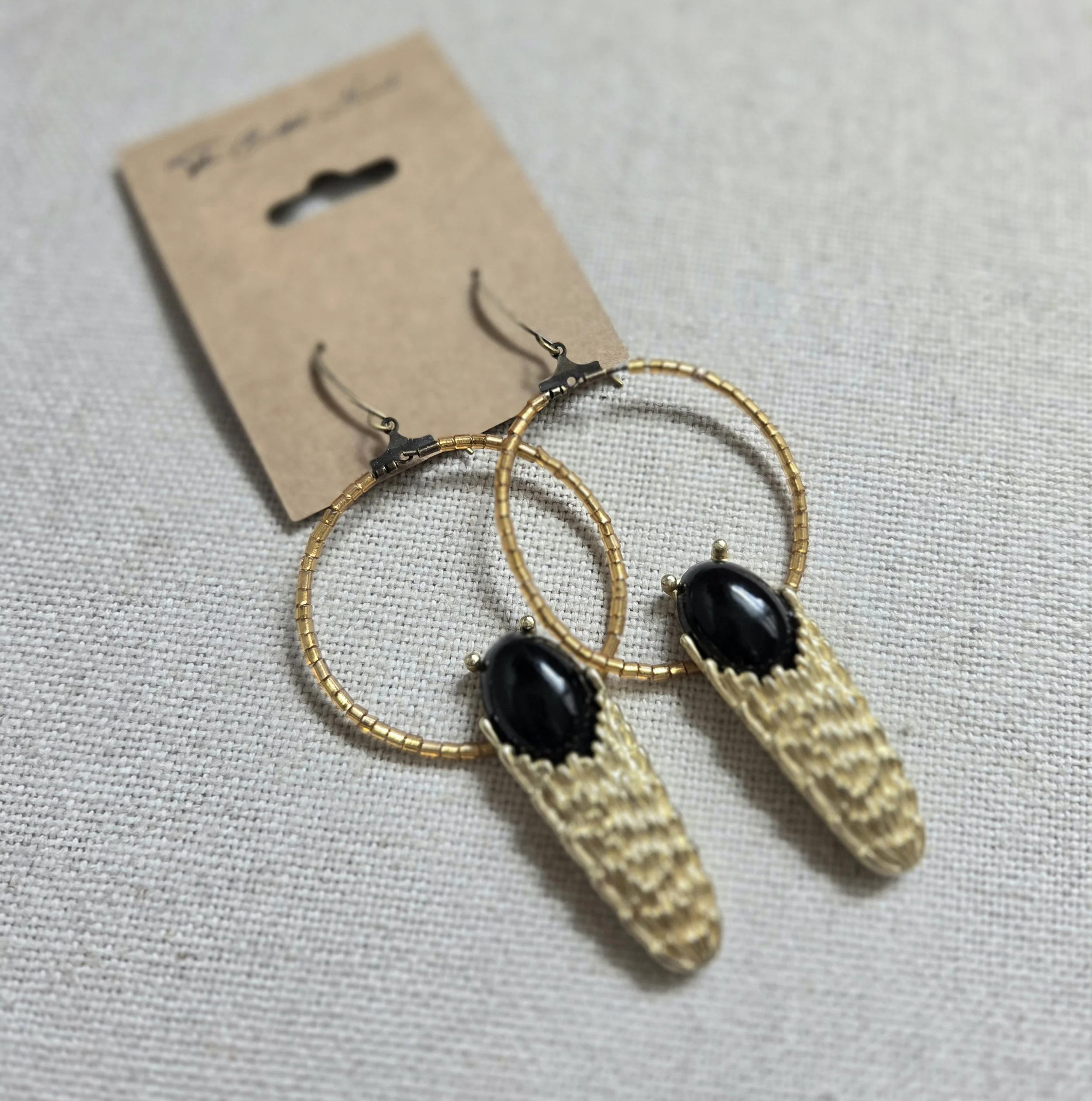 Vintage brass cicada charms with black cabochons