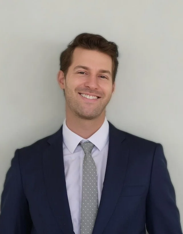 Christopher Tow, Director of Outreach.