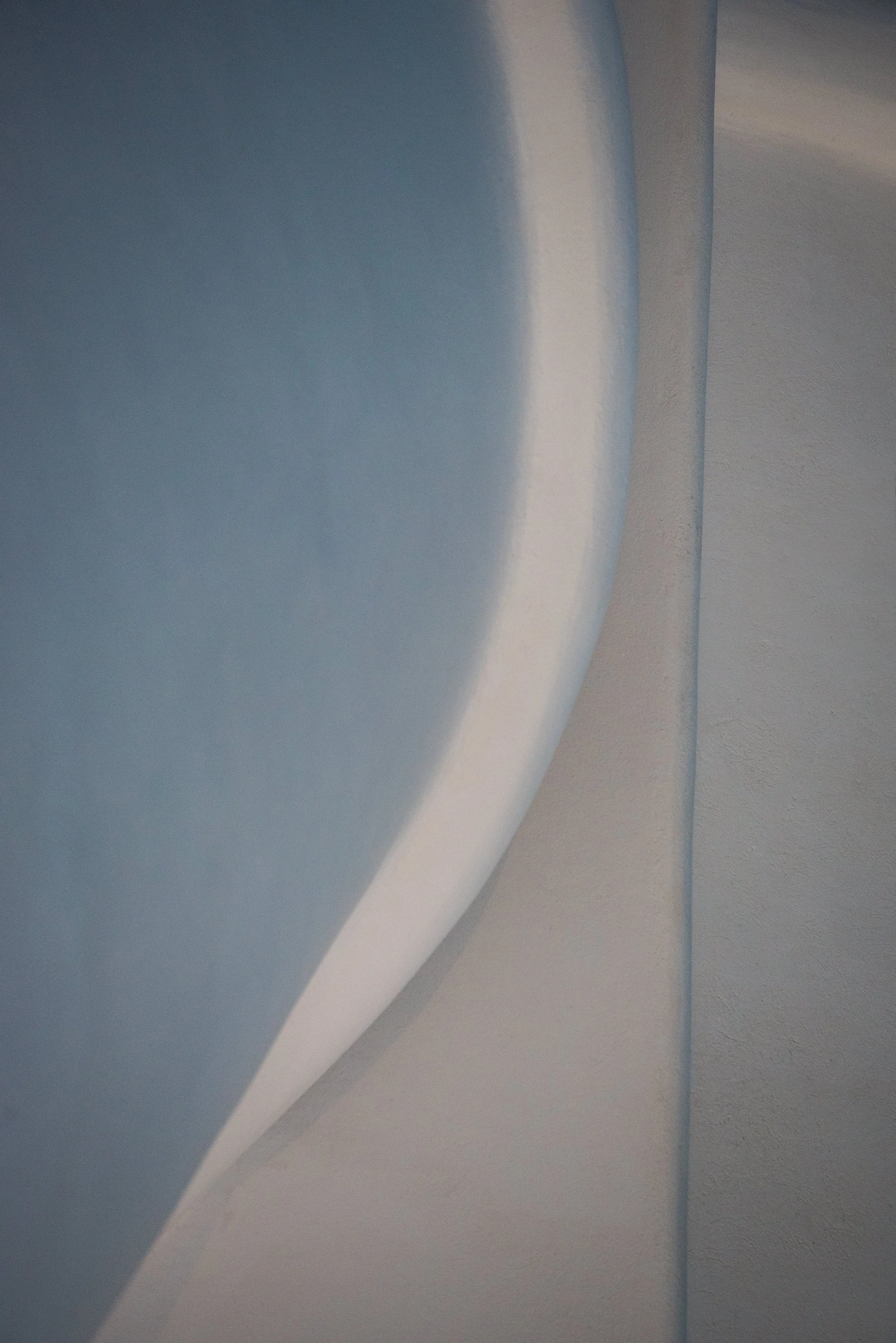 Abstract minimalist photography using sculptural shape and form in neutral colours