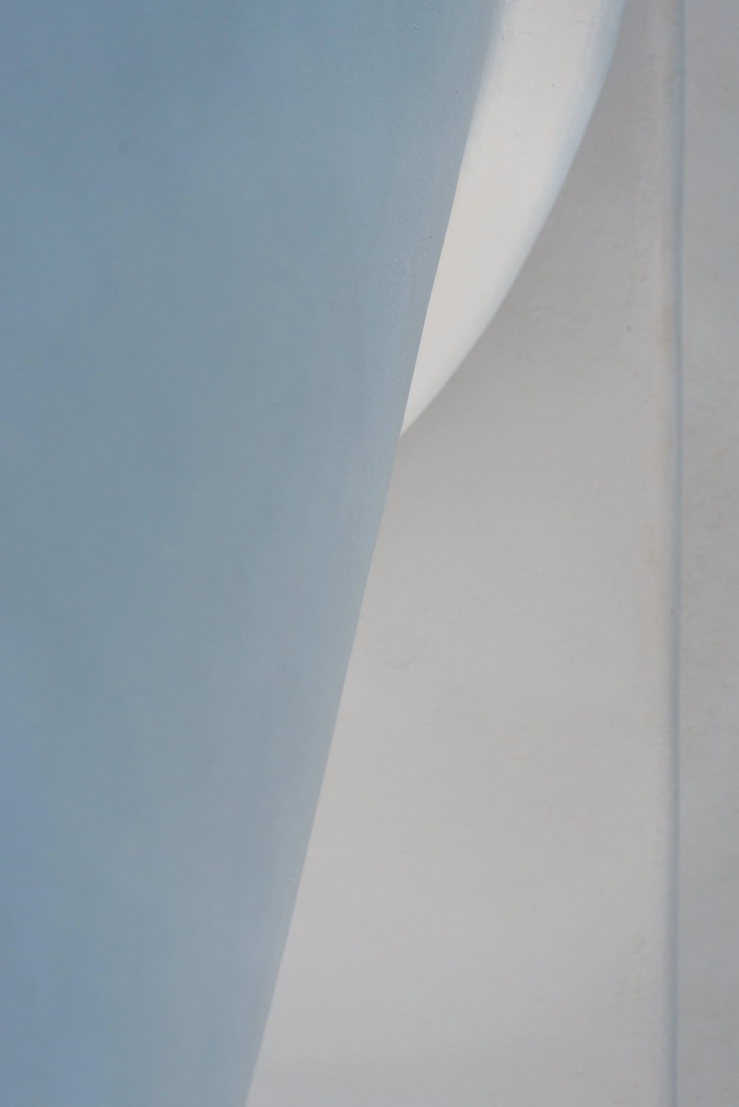 Abstract minimalist photography using sculptural shape and form in neutral colours