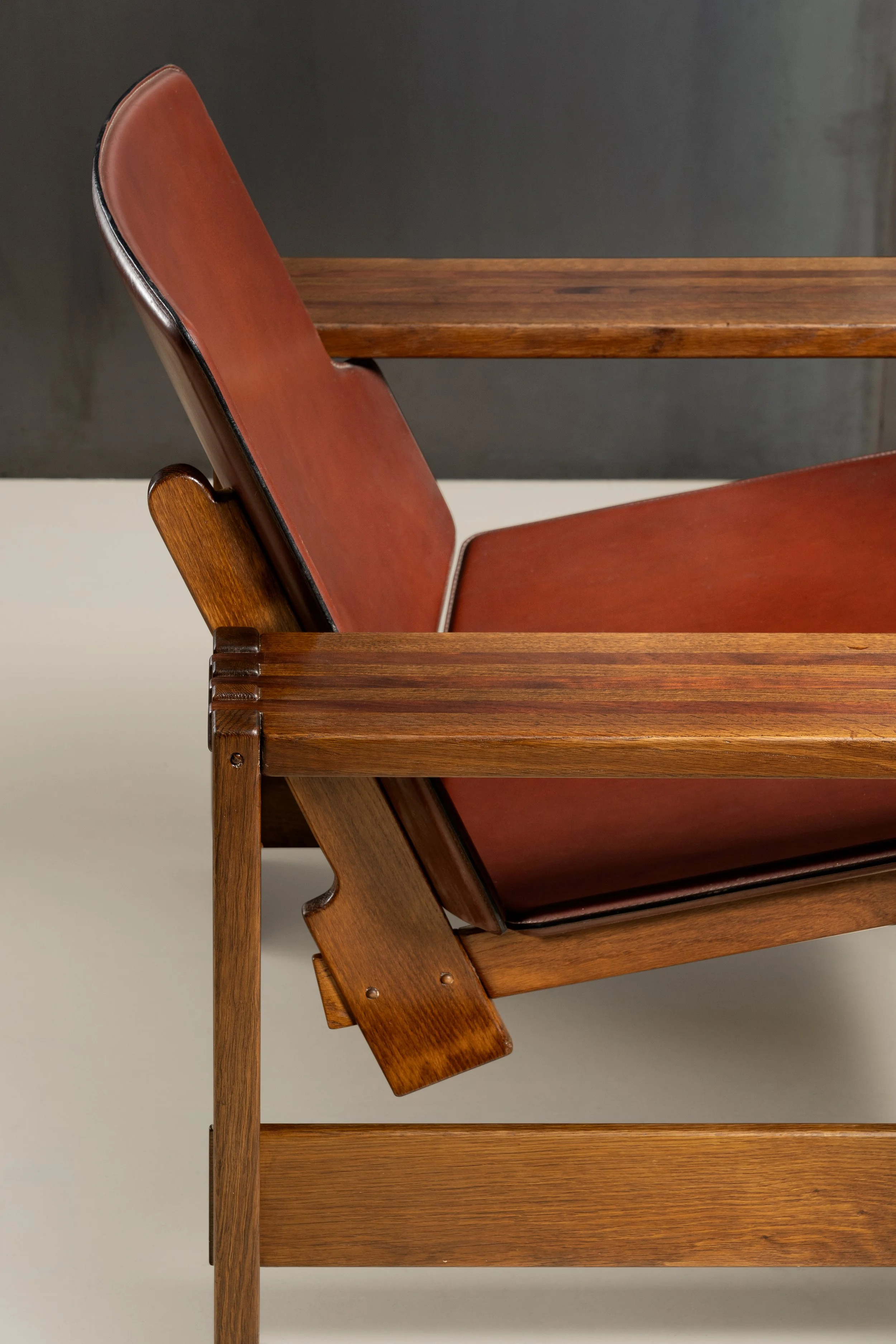 Rivadossi armchair, wood and leather. 1970s.
