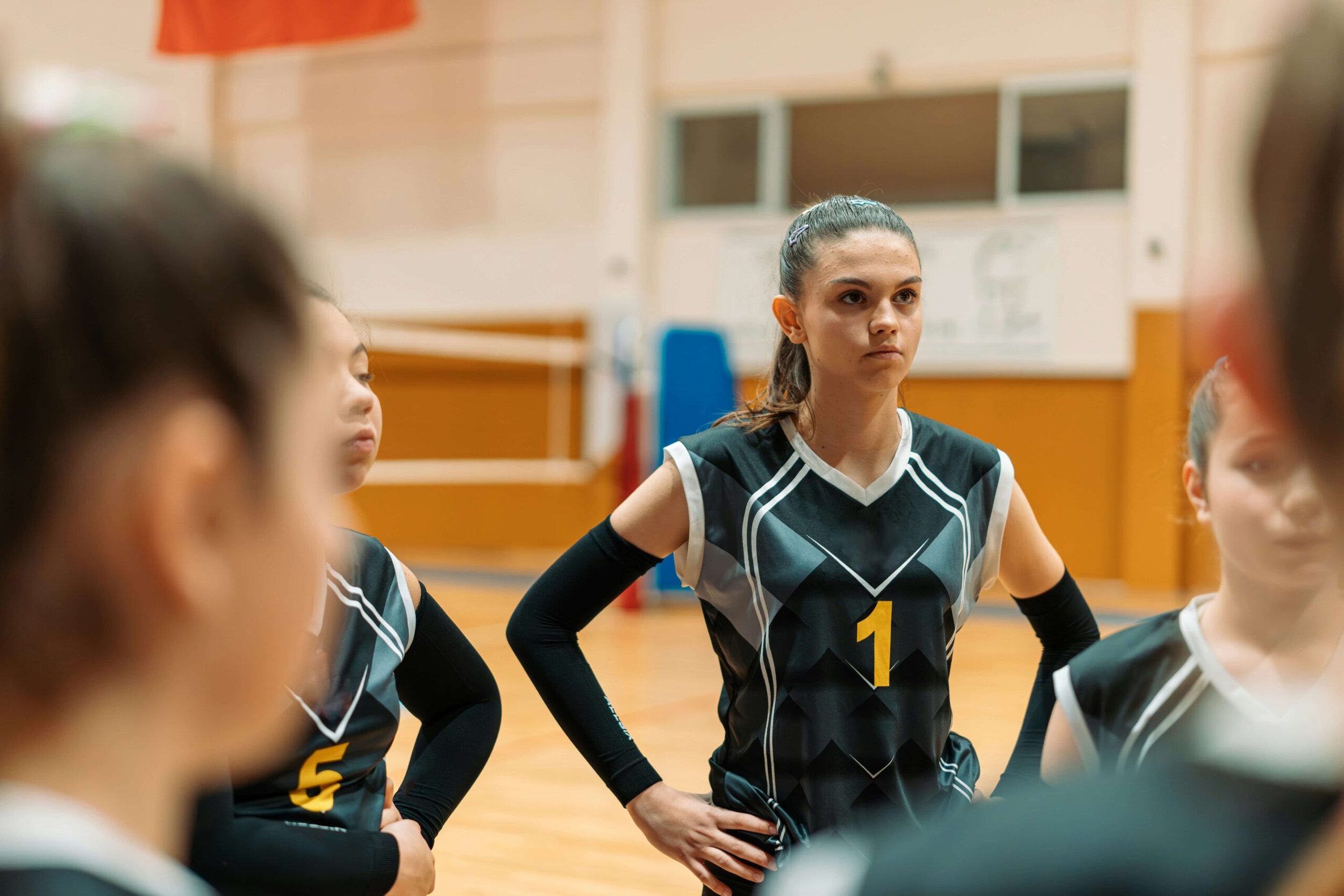 A girls volleyball huddle