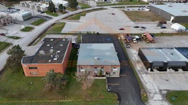 Recently completed reroof, converted an old asphalt and gravel roof into a modern 2 ply mod bit system.