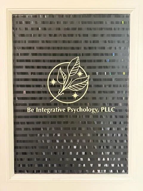 Sign for Be Integrative Psychology, PLLC with logo of leaf and stars