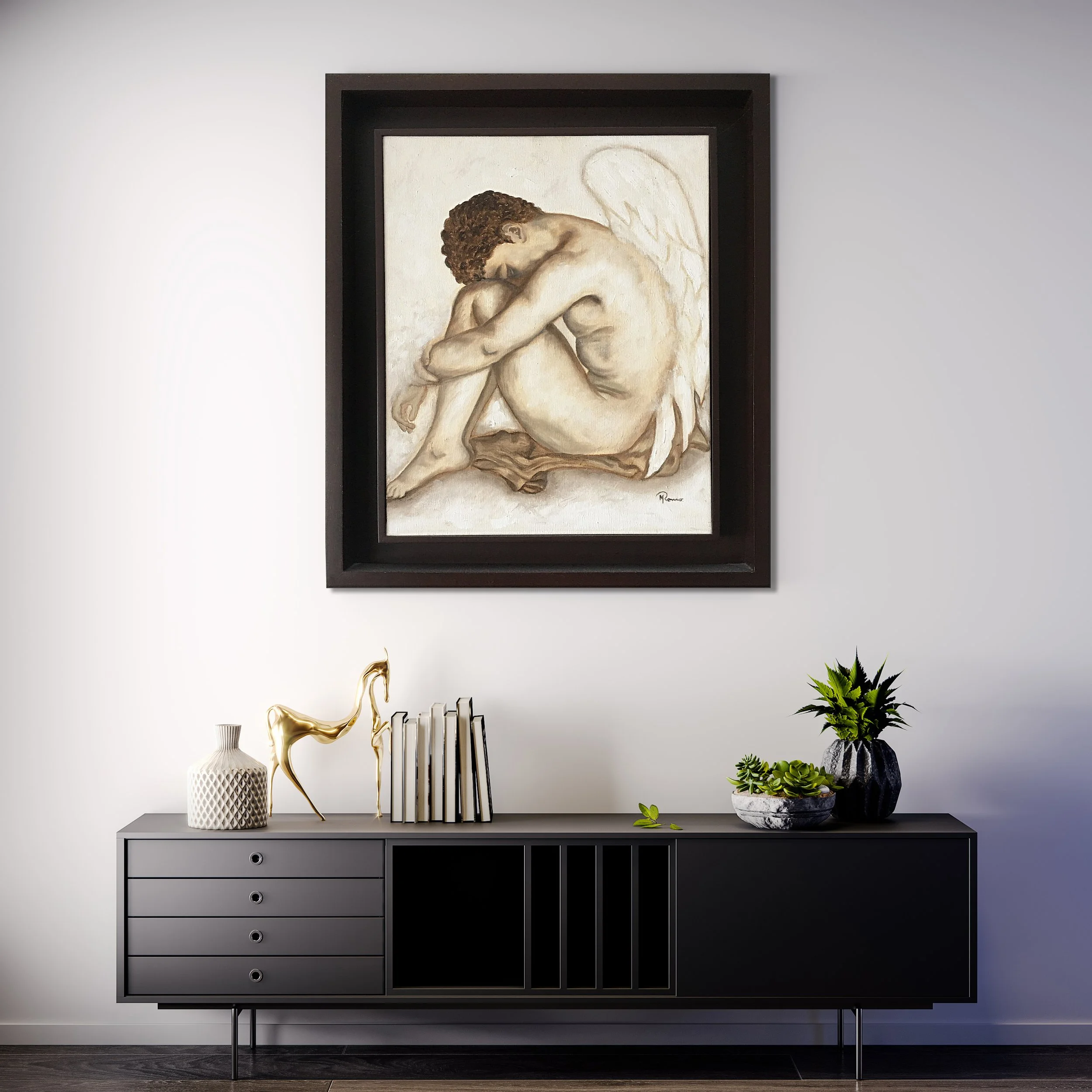 interior of a modern living room with a black console table, decorative items, and a framed painting of a winged angel sitting with face resting on knees