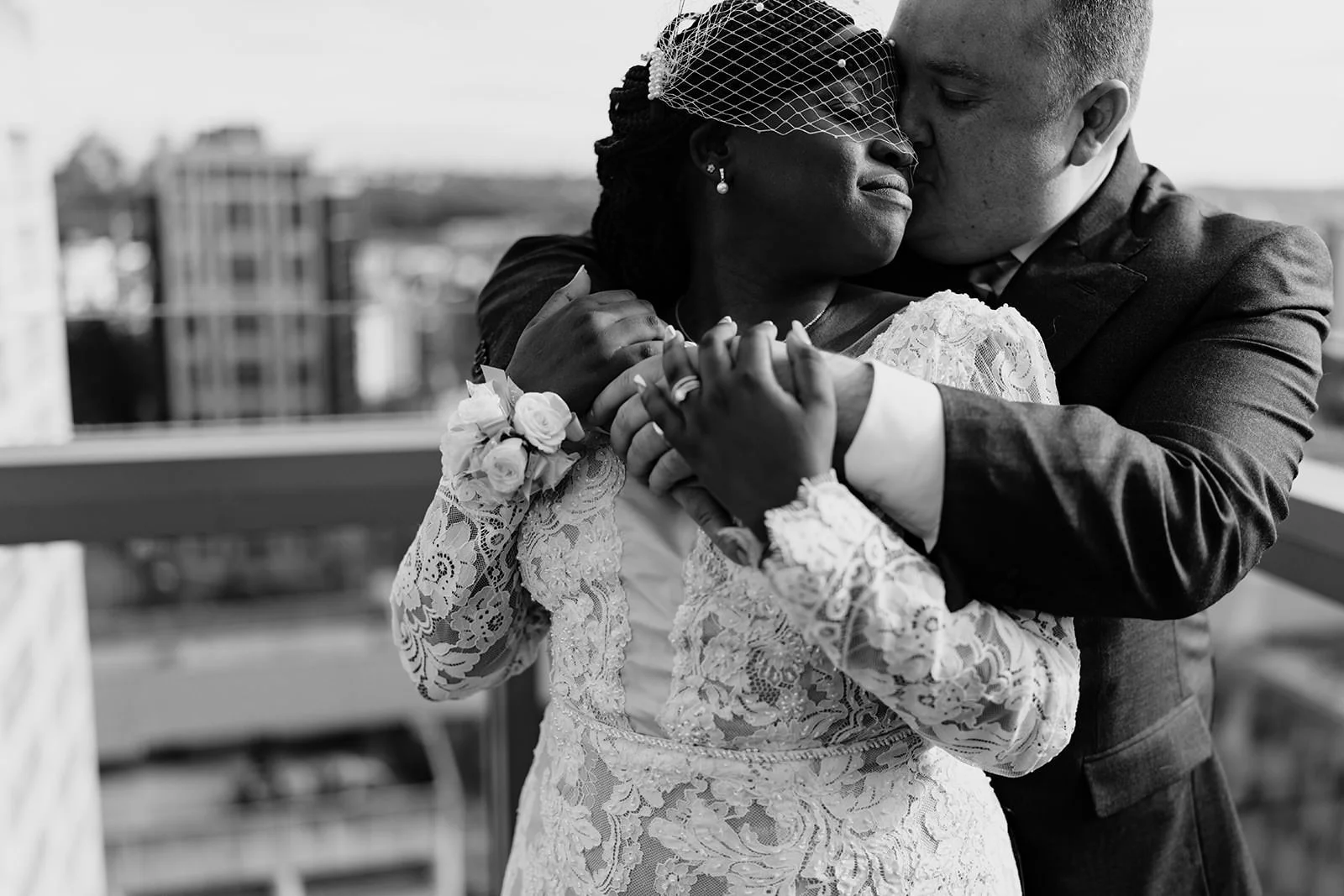 a wedding ceremony takes place amongst trees with the attendants looking at the bride and groom standing at the altar