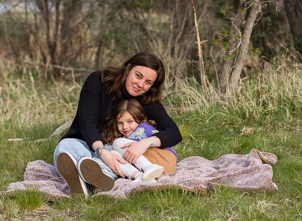 Mom & child snuggle in mother's day photo