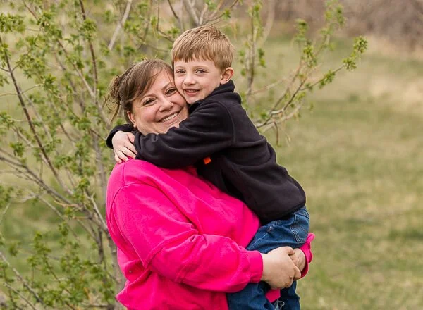 Mom and son snuggle during spring photo session