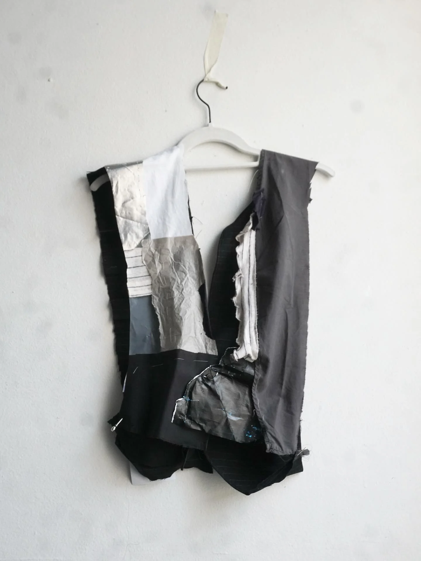 Pieces of Me 
Old Artwork, Plastic, Grey Tissue Paper, Metallic Wrapping Paper, Cream Striped Polo, Grey Collared Shirt, Black Striped Collars Shirt, Black Collared Shirt, Kept Cocktail Picks, Button, thread 

2024 - C2tM