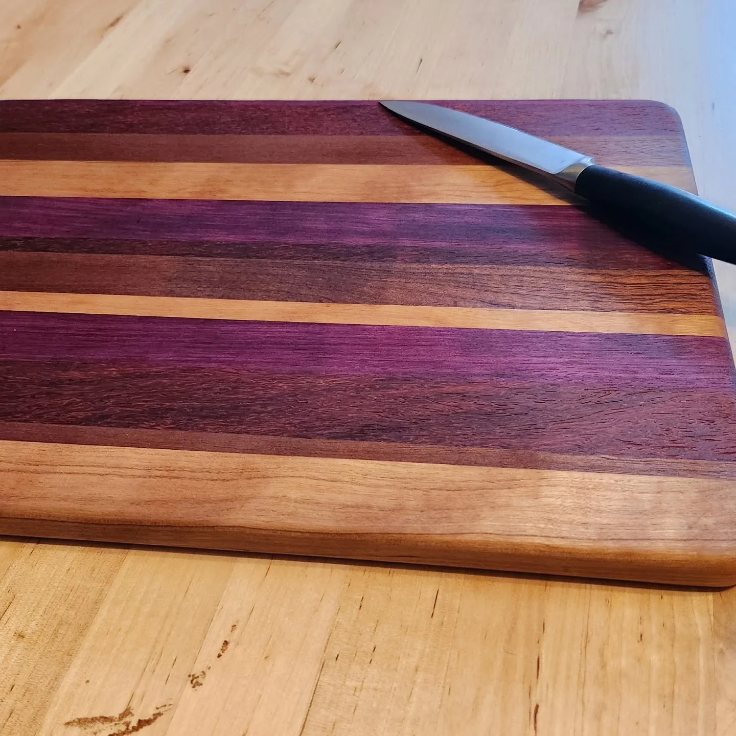 #cuttingboards #cuttingboard most recent piece done cherry, sapele, padauk, and purpleheart