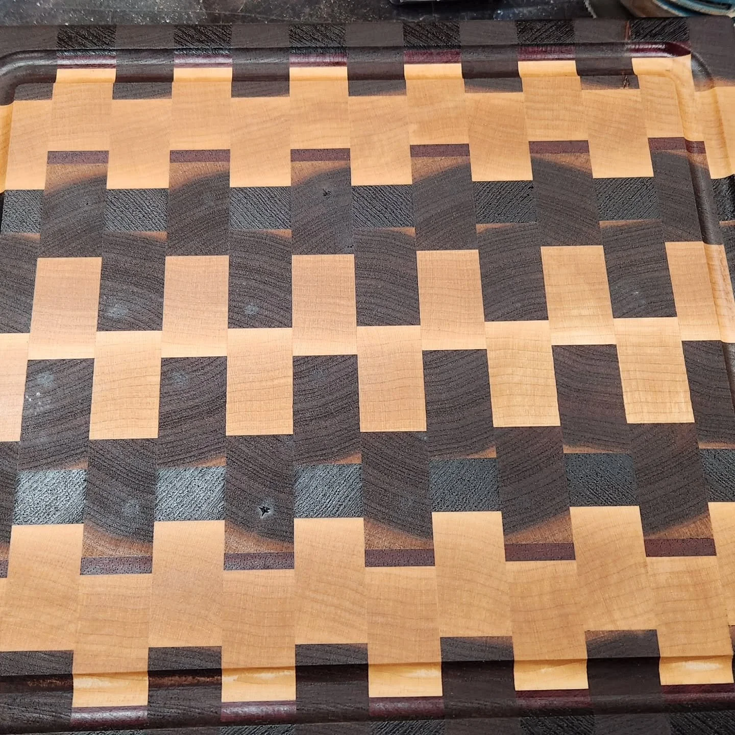 End grain cutting board I made for my father.  It's walnut, maple, padauk, purpleheart, and wenge. #endgraincuttingboard #cuttingboard #cuttingboards