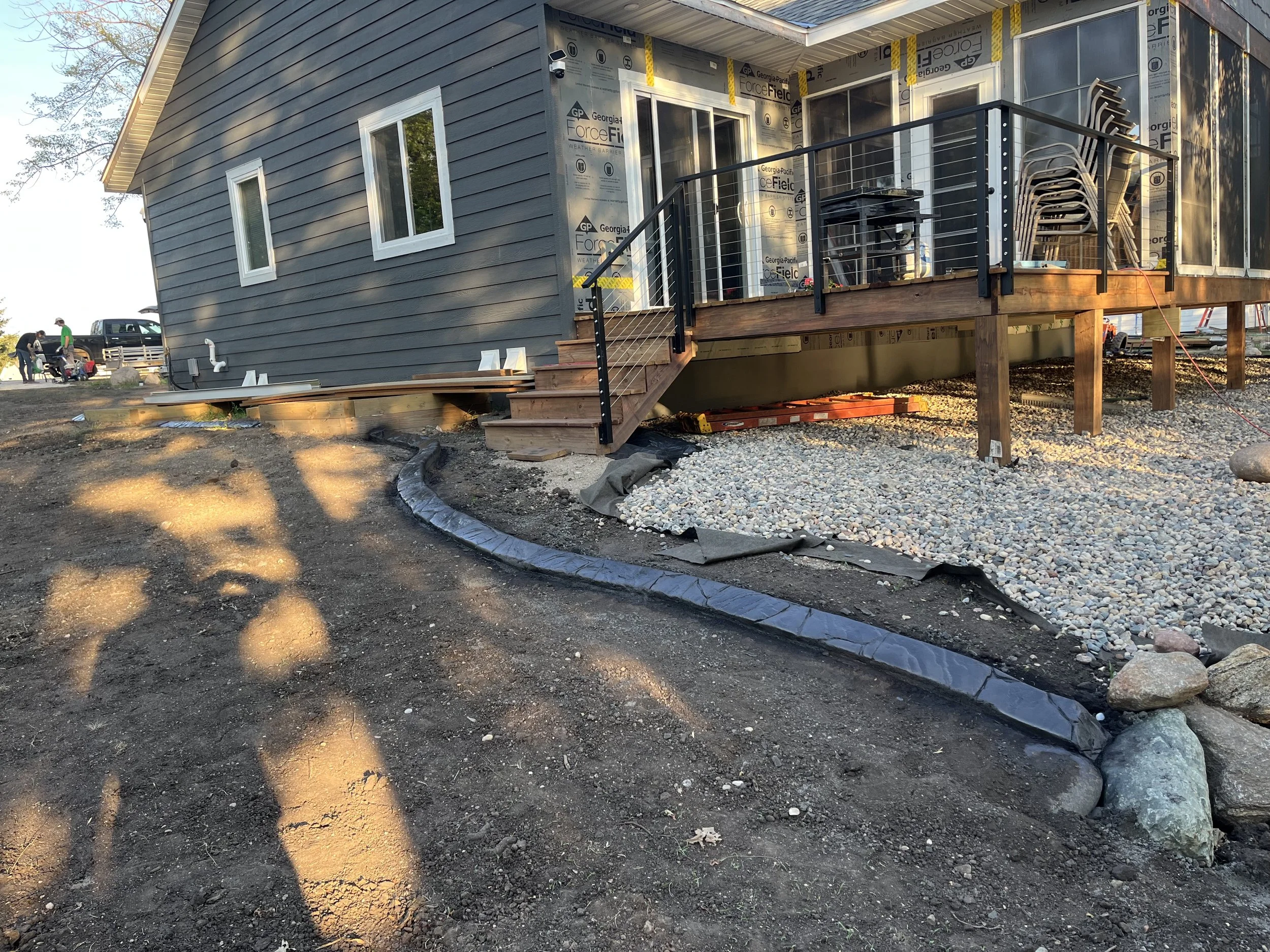 Concrete Edging Around Patio Deck