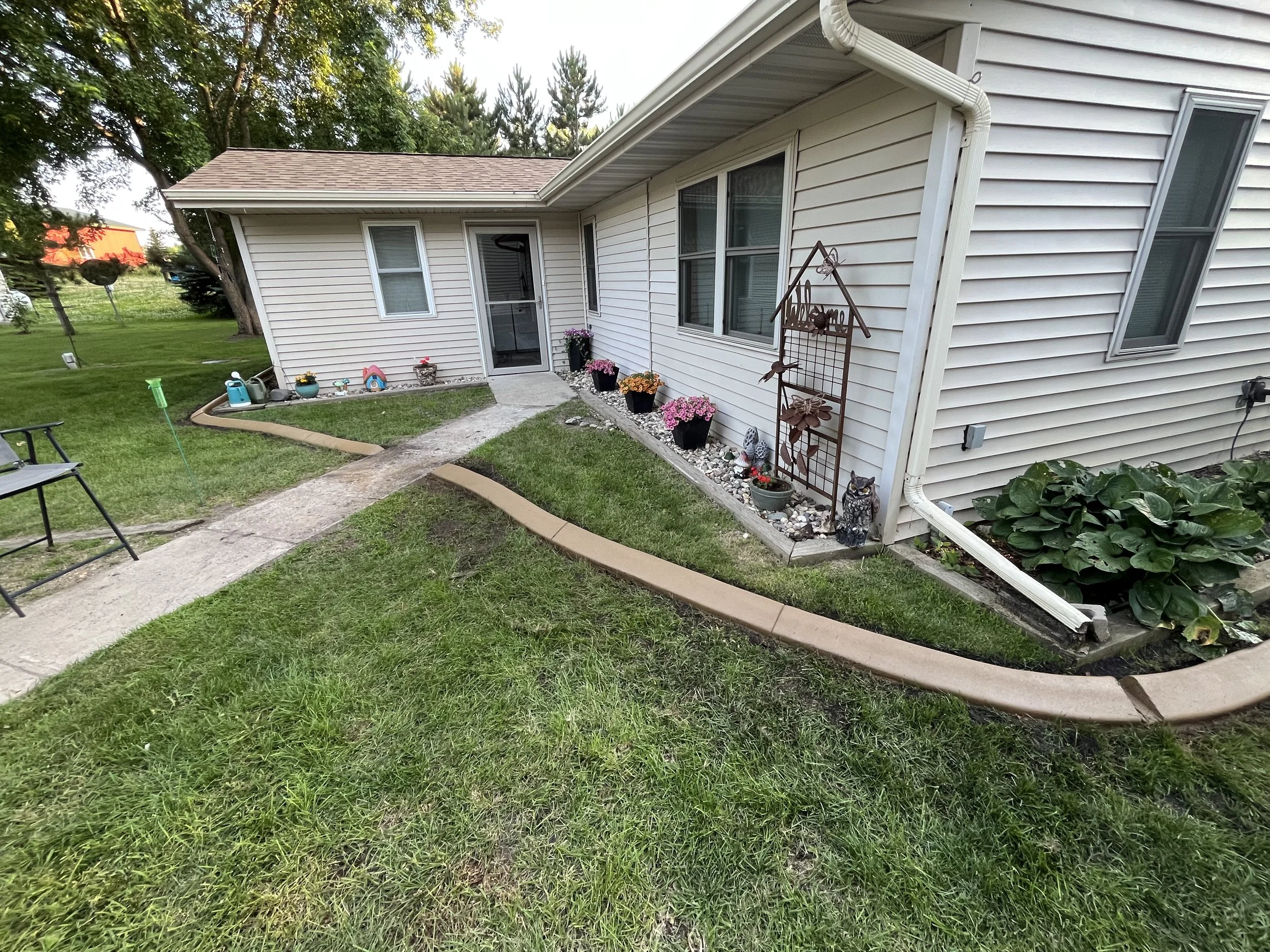 Buff Colored Concrete Landscape Edging in Lakes Area Minnesota