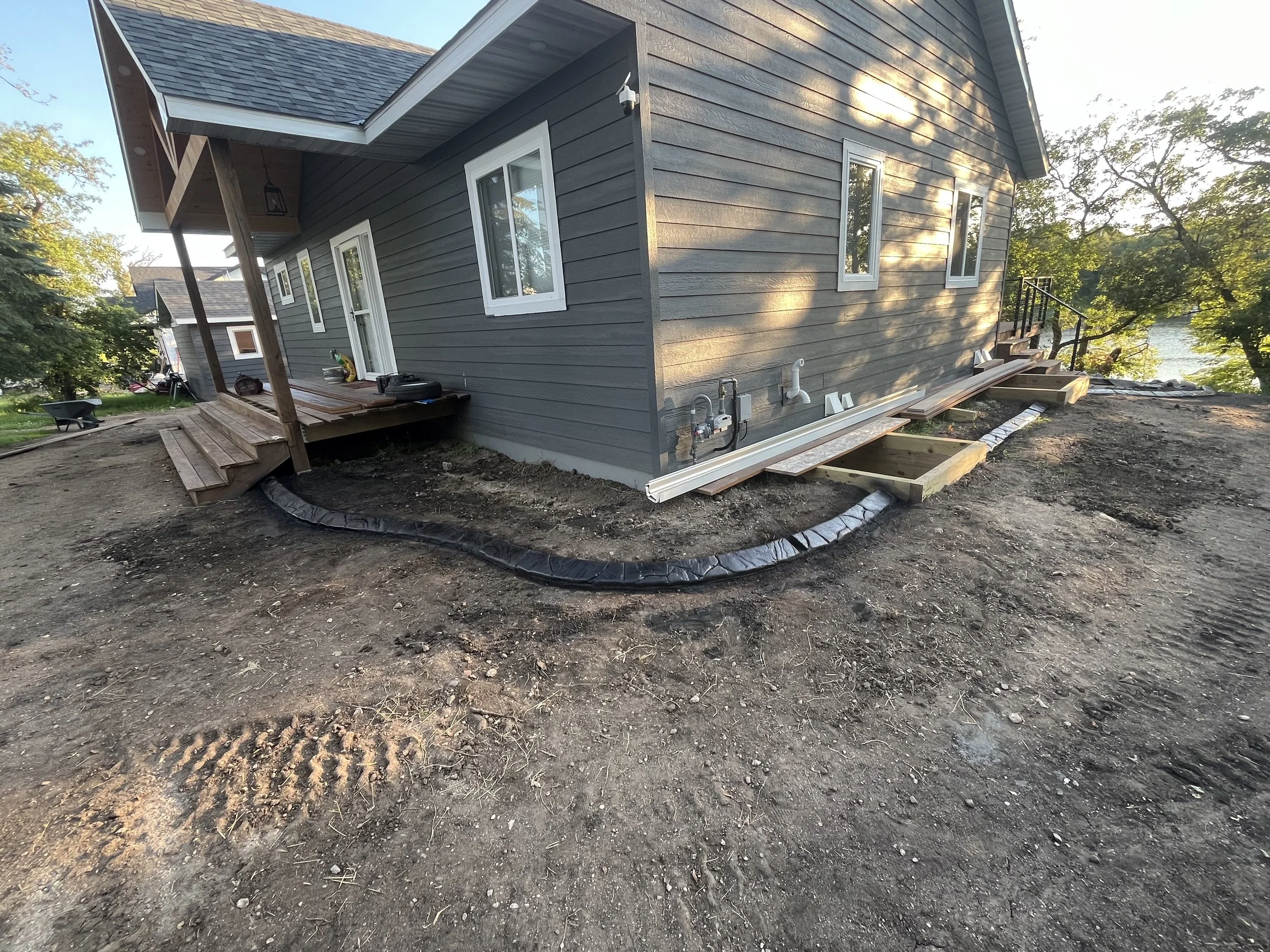 Continuous Concrete Curbing Around New Construction House