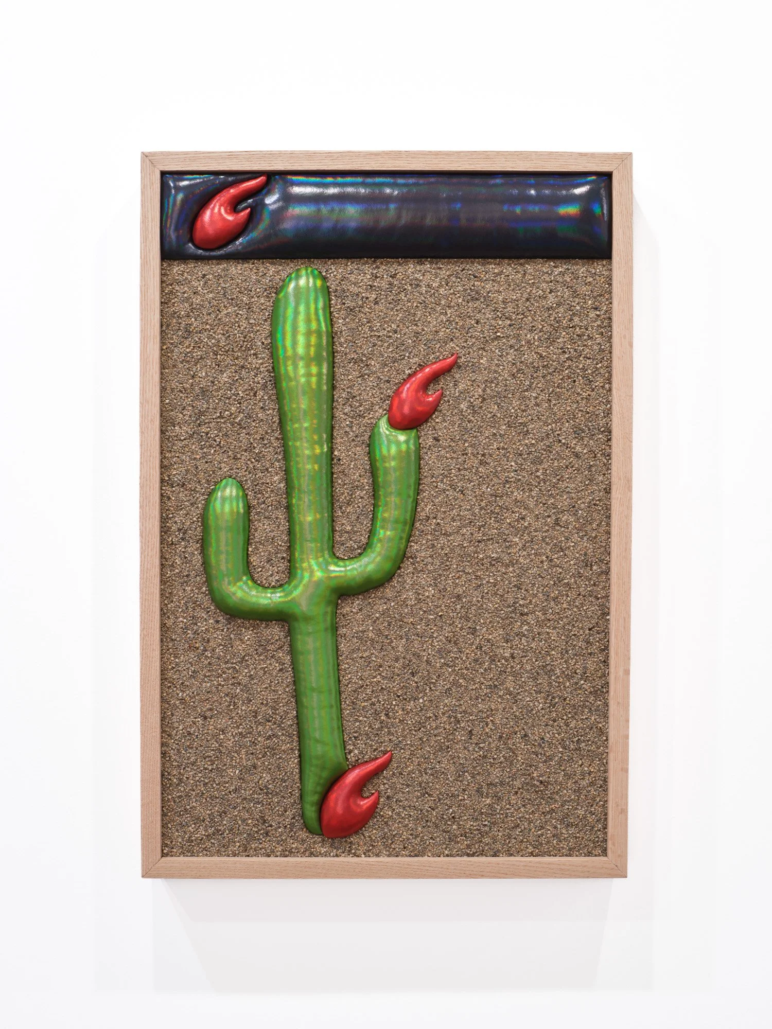 Jon Young 
Cactus Flower, 2026 
White Oak, Iridescent Fabric, Batting, and Sand from the Mojave Desert, CA 
19 x 29 x 3 inches