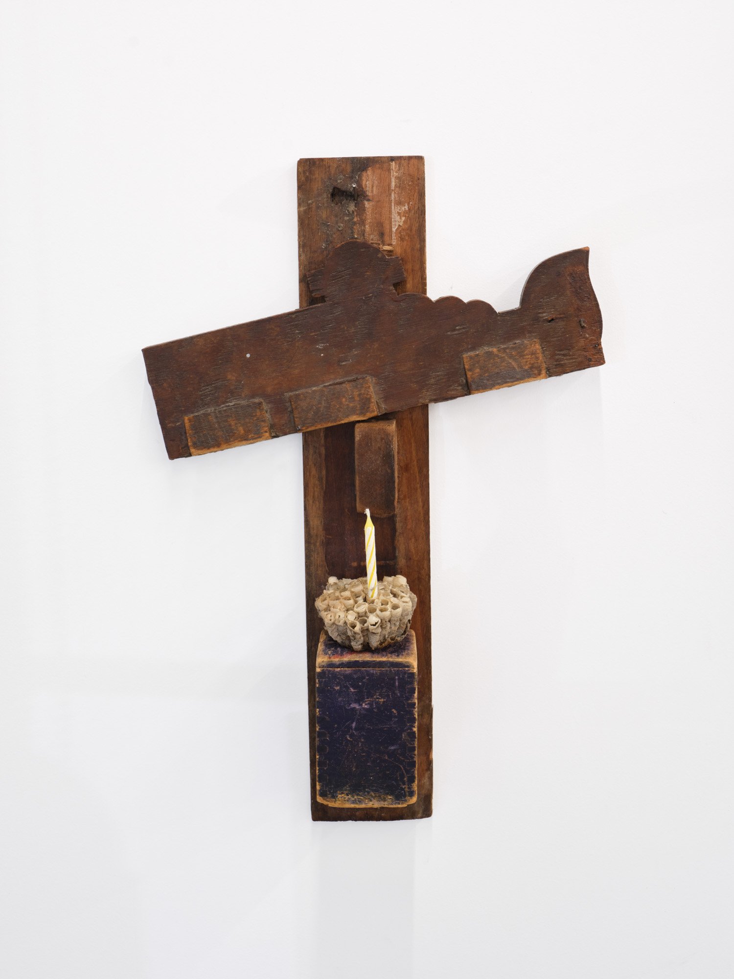 Barry Elkanick 
Before My Birth, 2026 
Found wood, wasp nest, candle 
11 x16 x 3 inches