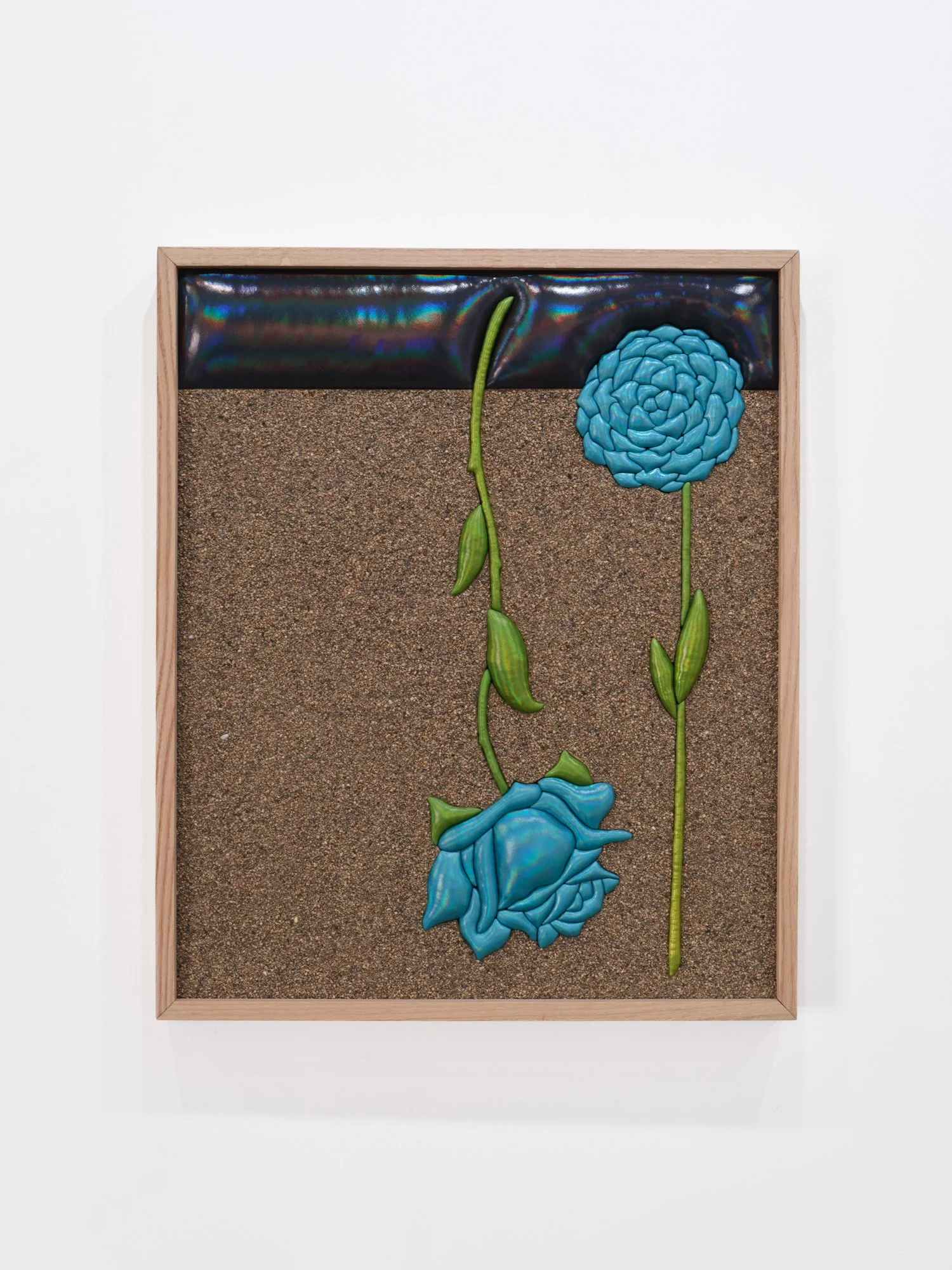 Jon Young 
Further Than Water, 2026 
White Oak, Iridescent Fabric, Batting, and Sand from Santa Monica, CA 
25 x 30 x 2 inches