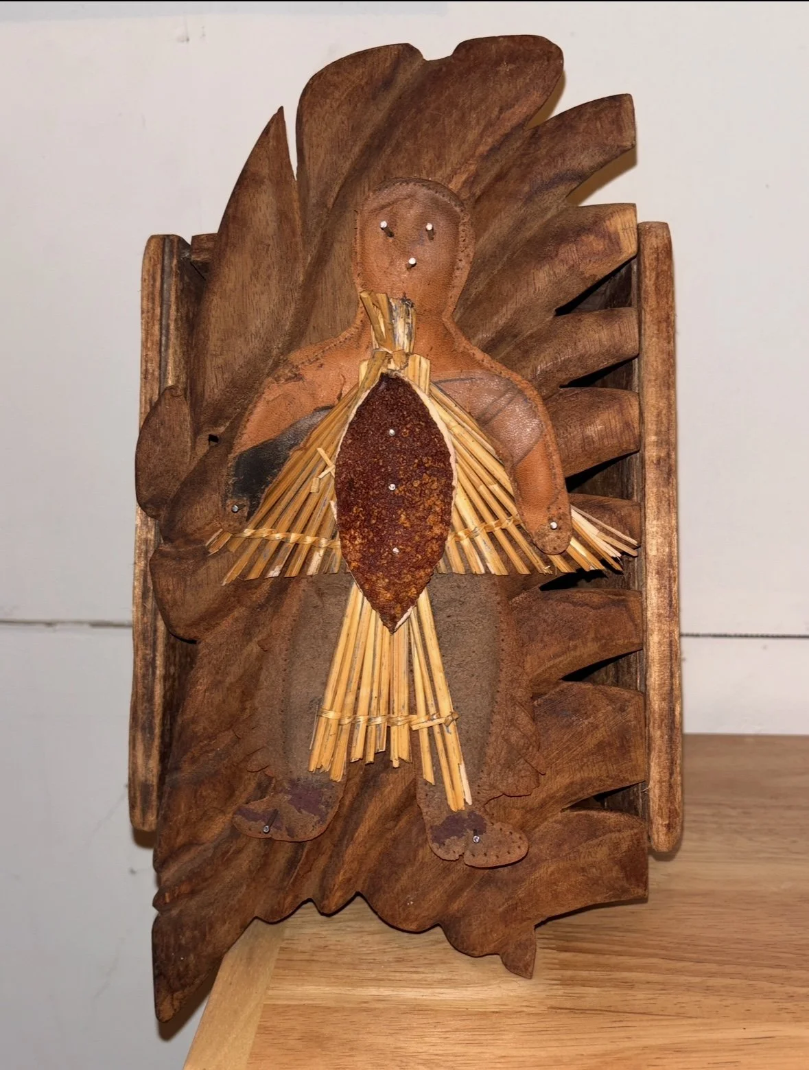 Barry Elkanick 
A Quiet Song Plays for the Diseased Crow, 2026 
Leather, orange peel, nails, rattan, wood 
13 x 8 inches