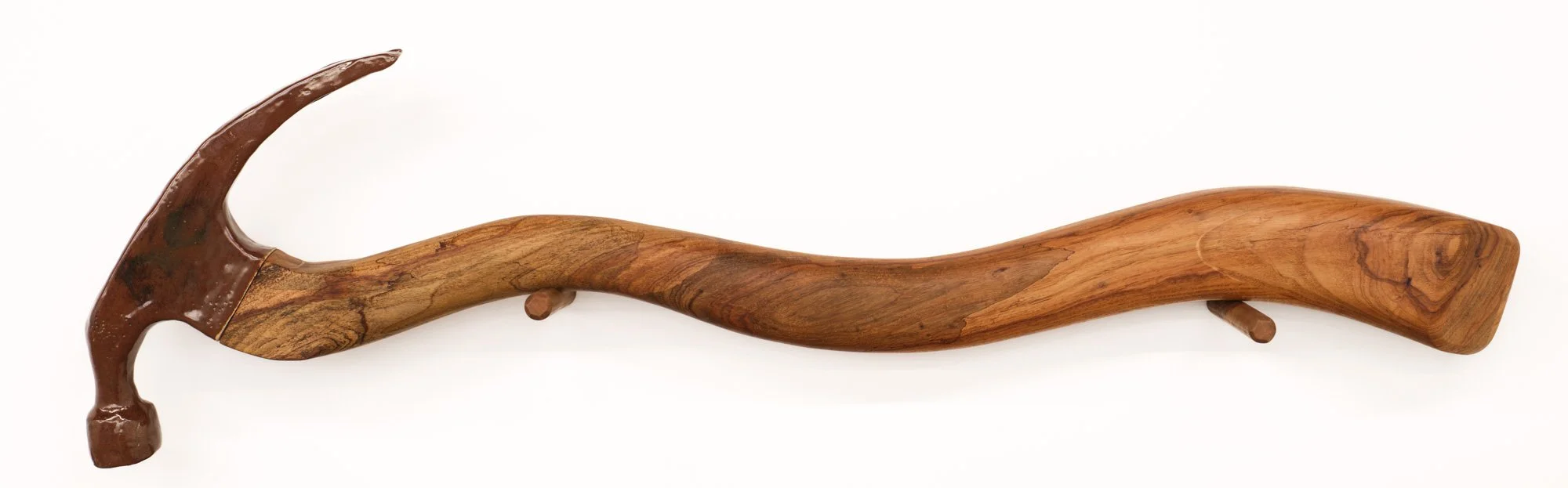 Conner O'Leary 
Hammer TTCBT, 2026 
Ceramic, glaze, and pecan wood 
55 (w) x 15 (h) x 3 (d)