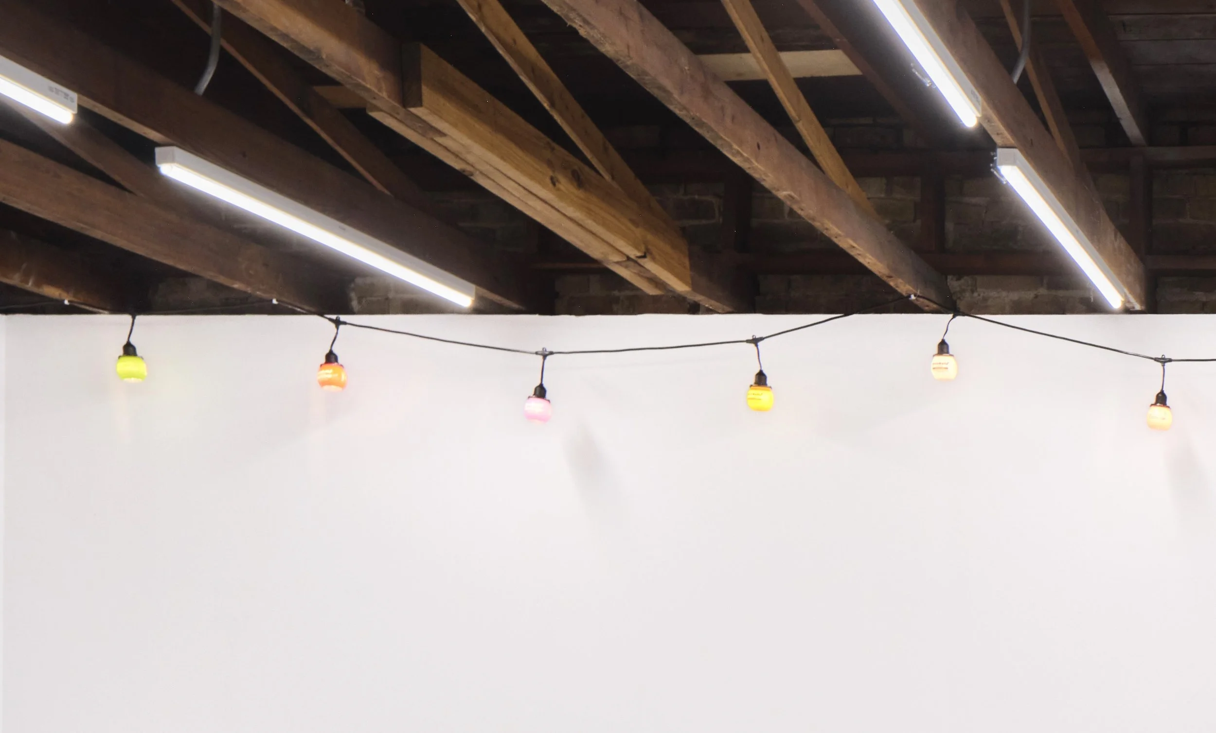 Sam Keller 
Buzzball patio lightz, 2026 
Buzzballz, HDPE plastic, LED string lights. 
Dimensions Variable