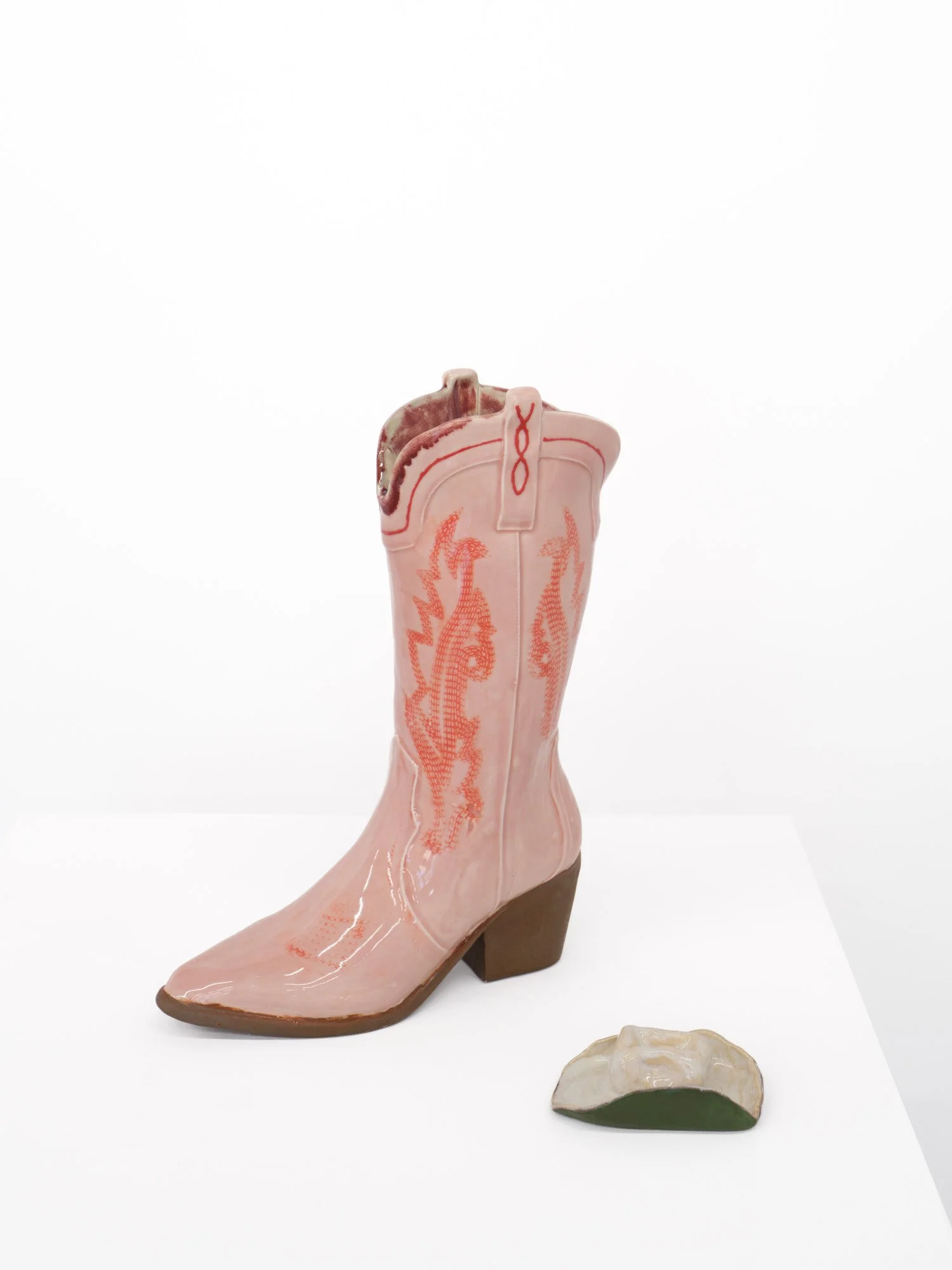 Cindy Elizabeth 
Boots on the Ground #1, 2026 
Ceramic cast of cowboy boot, glaze 
Boot: 9 (l) x 12 (h) x 2.5 (d) inches; hat: 4 x 2 x 2 inches
