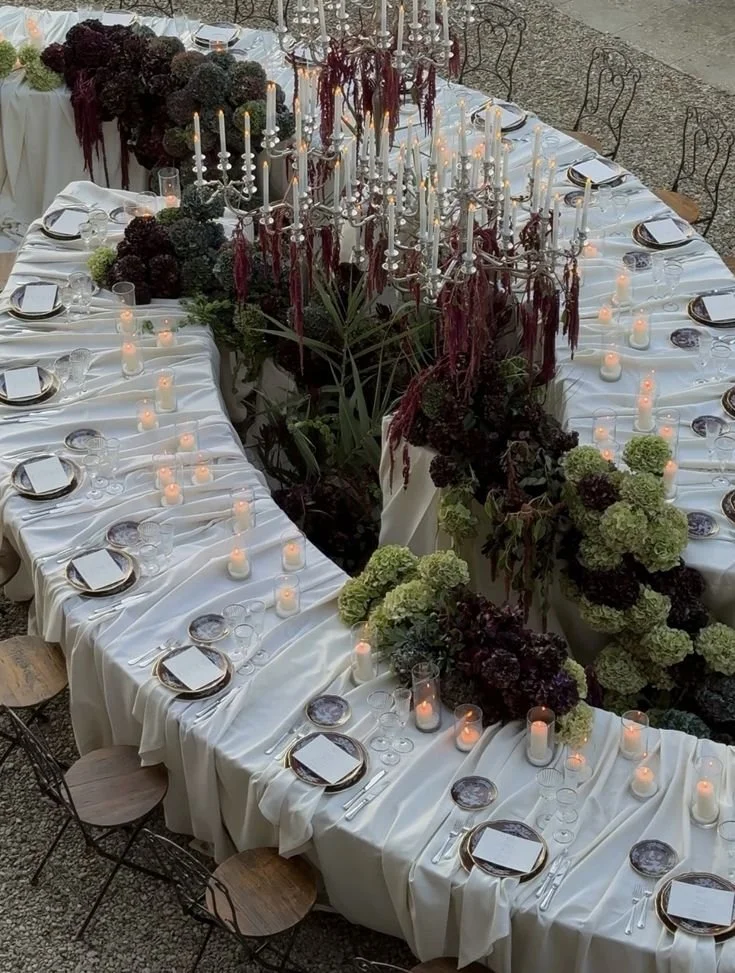Serpentine Table Cute.jpg