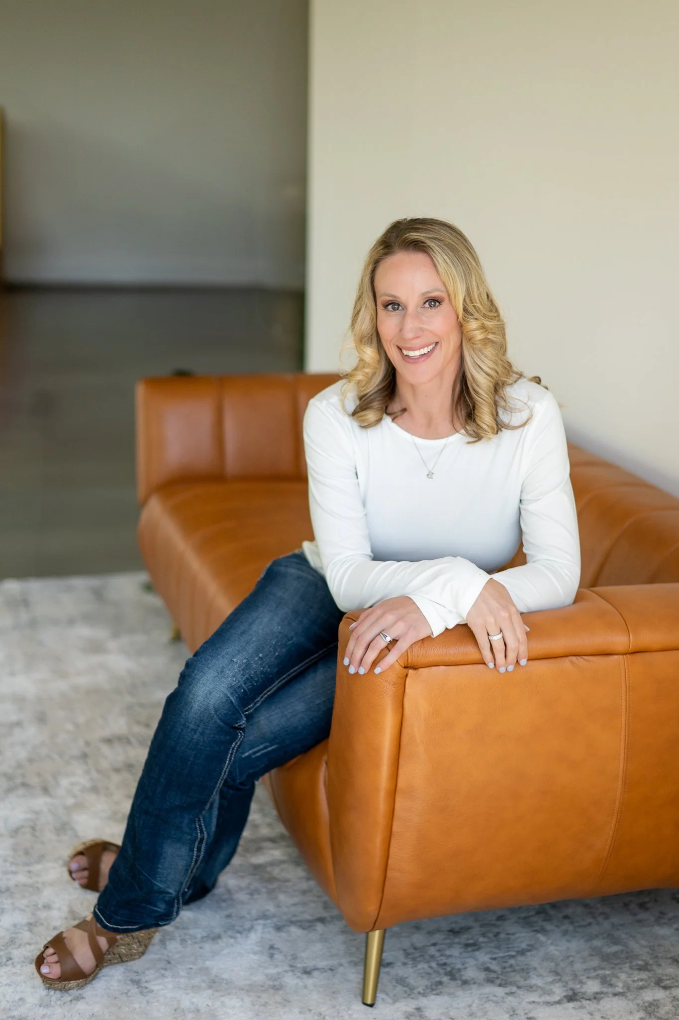 Modern branding portrait captured at Morningstar Studio’s natural light space in Denver, Colorado, offering personal branding and professional headshot sessions in a clean, modern setting.