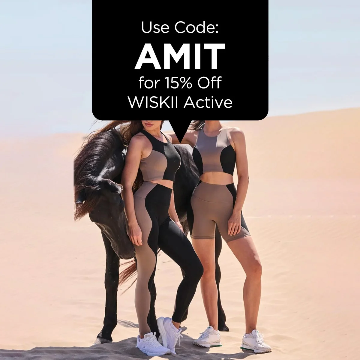 Two women in sportswear standing in a desert with sand dunes in the background, with a promo discount code for 15% off WISKII Active.