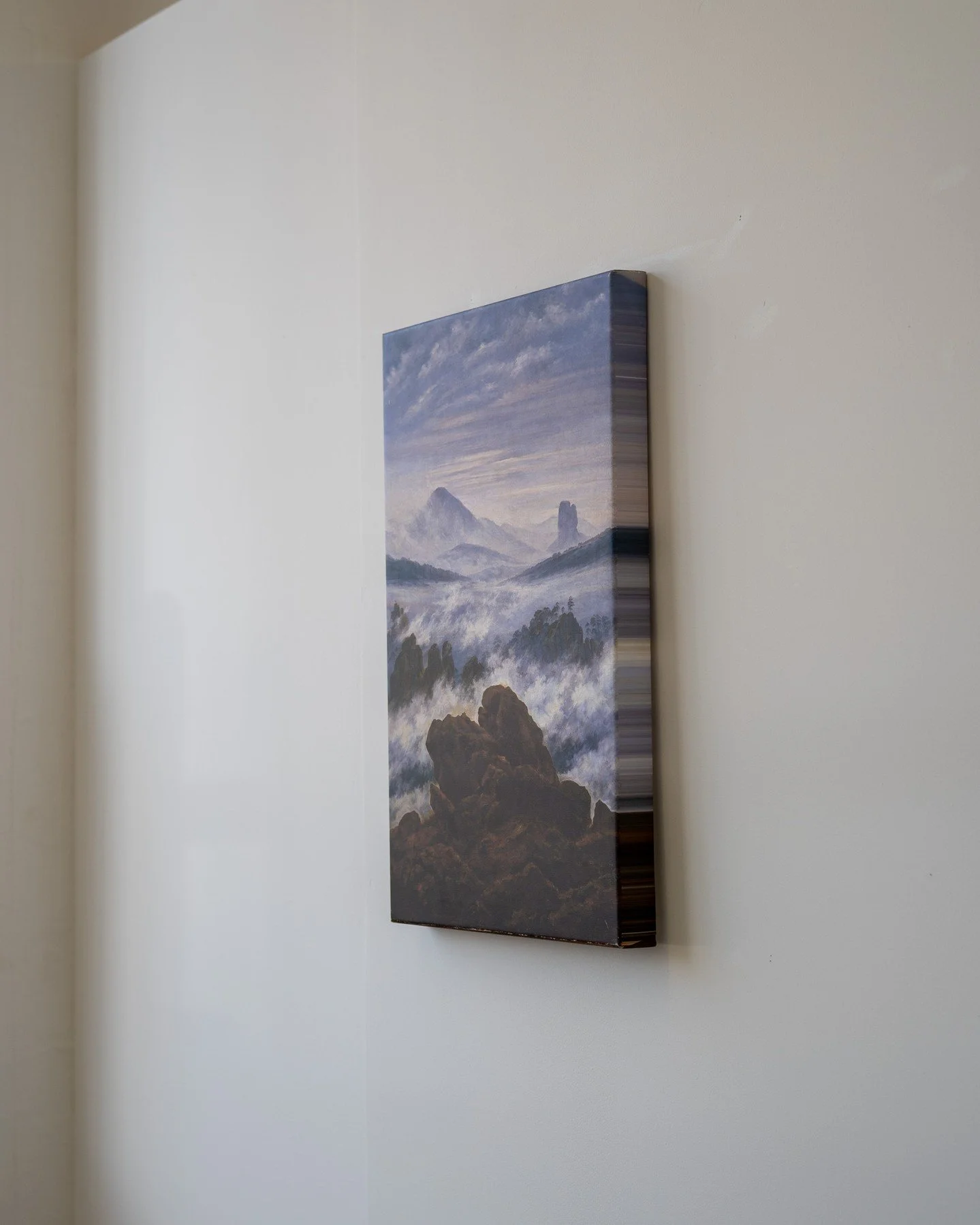 R&uuml;ckenfigur, 2025

Caspar David Friedrich&rsquo;s wanderer is removed, leaving the landscape to hold the position he once occupied. Reproduced as cheap mail-order canvas, the image persists somewhere between Romantic authority and domestic d&eac
