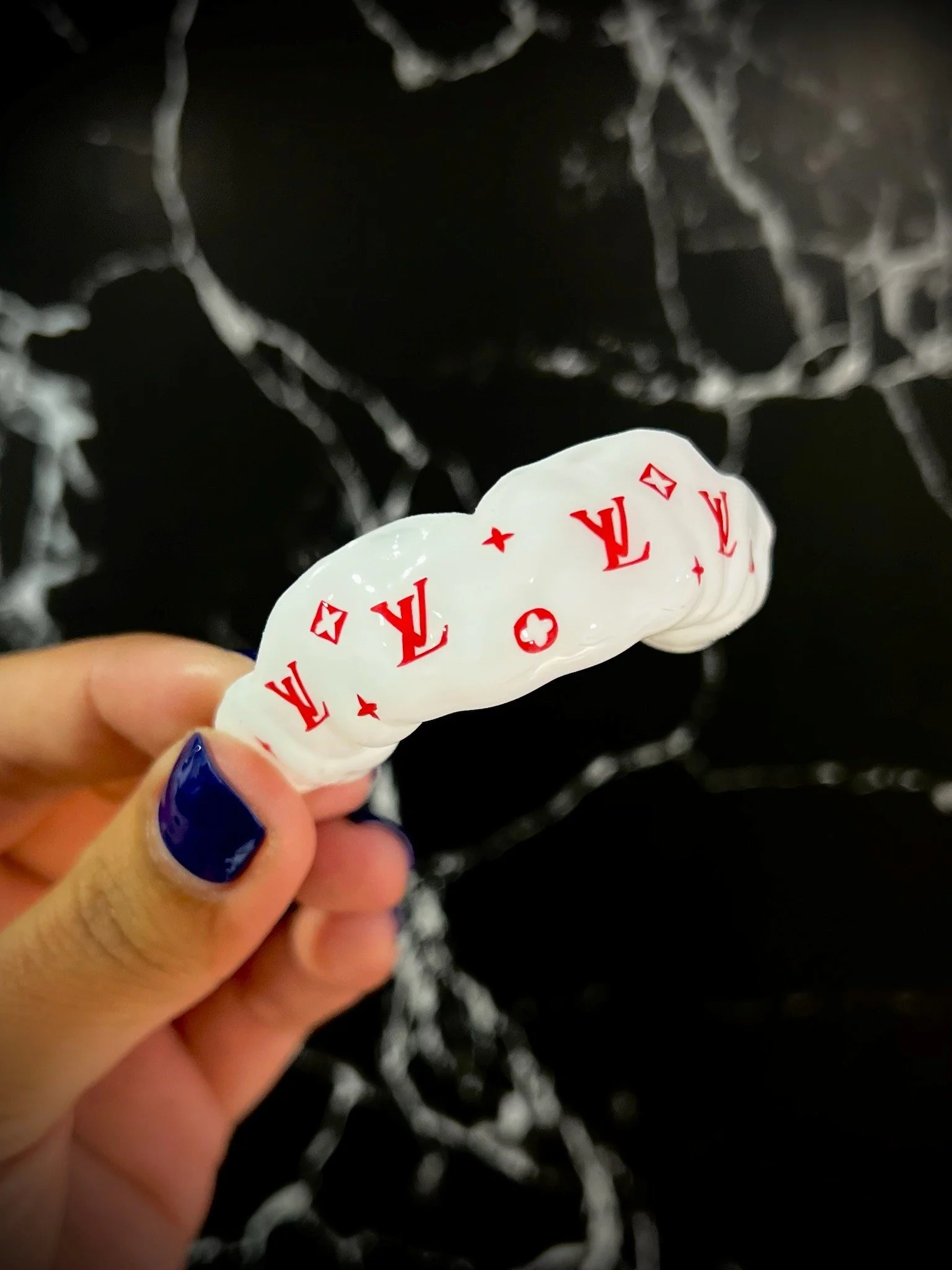 Additional customised mouthguard for same person