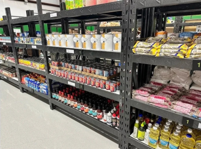 Stocked shelves with food items to be distributed