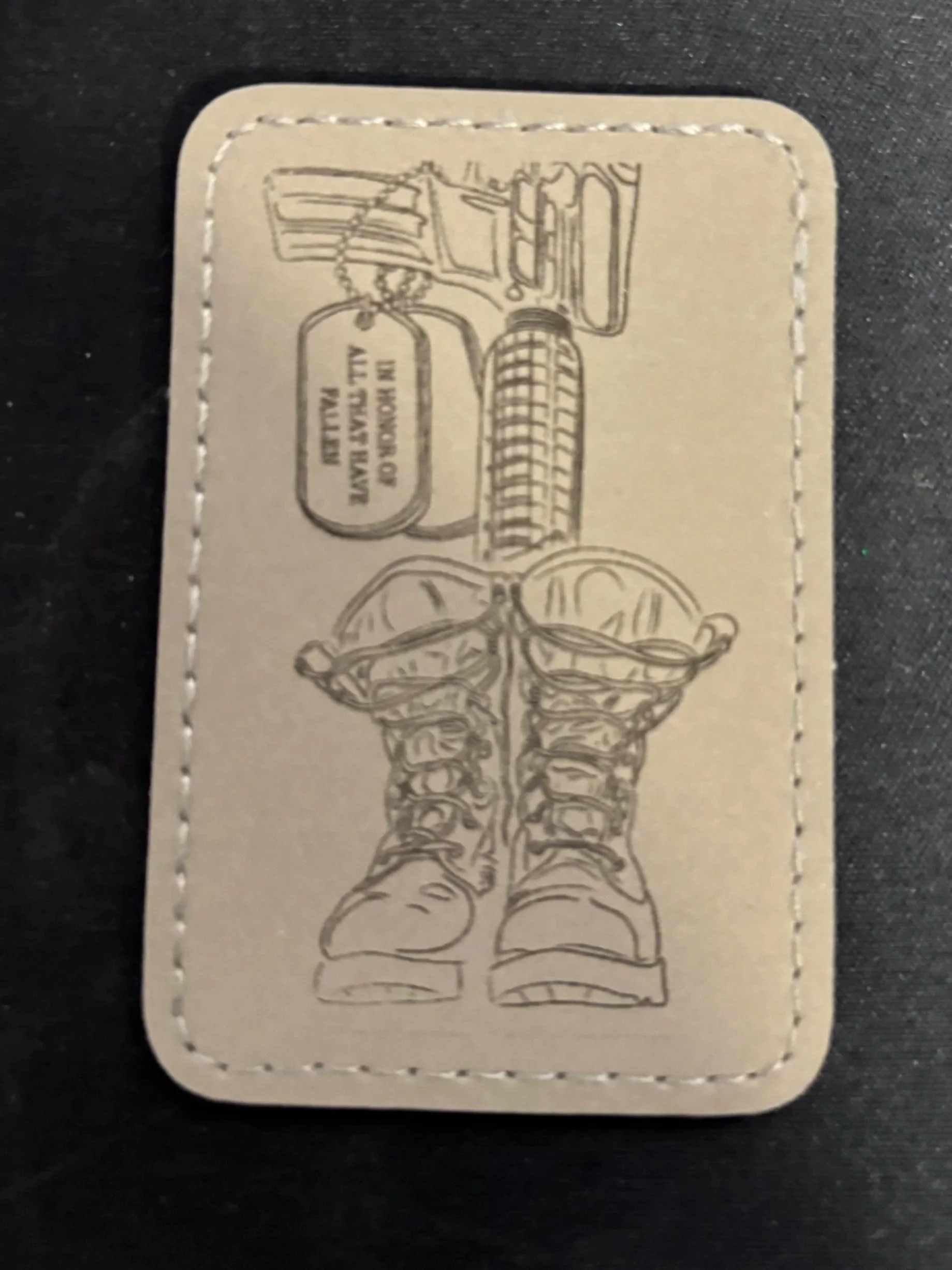 A vintage-style illustration of hiking boots with a chain and lock, and a tag that reads, "If found, call 911 or leave it."