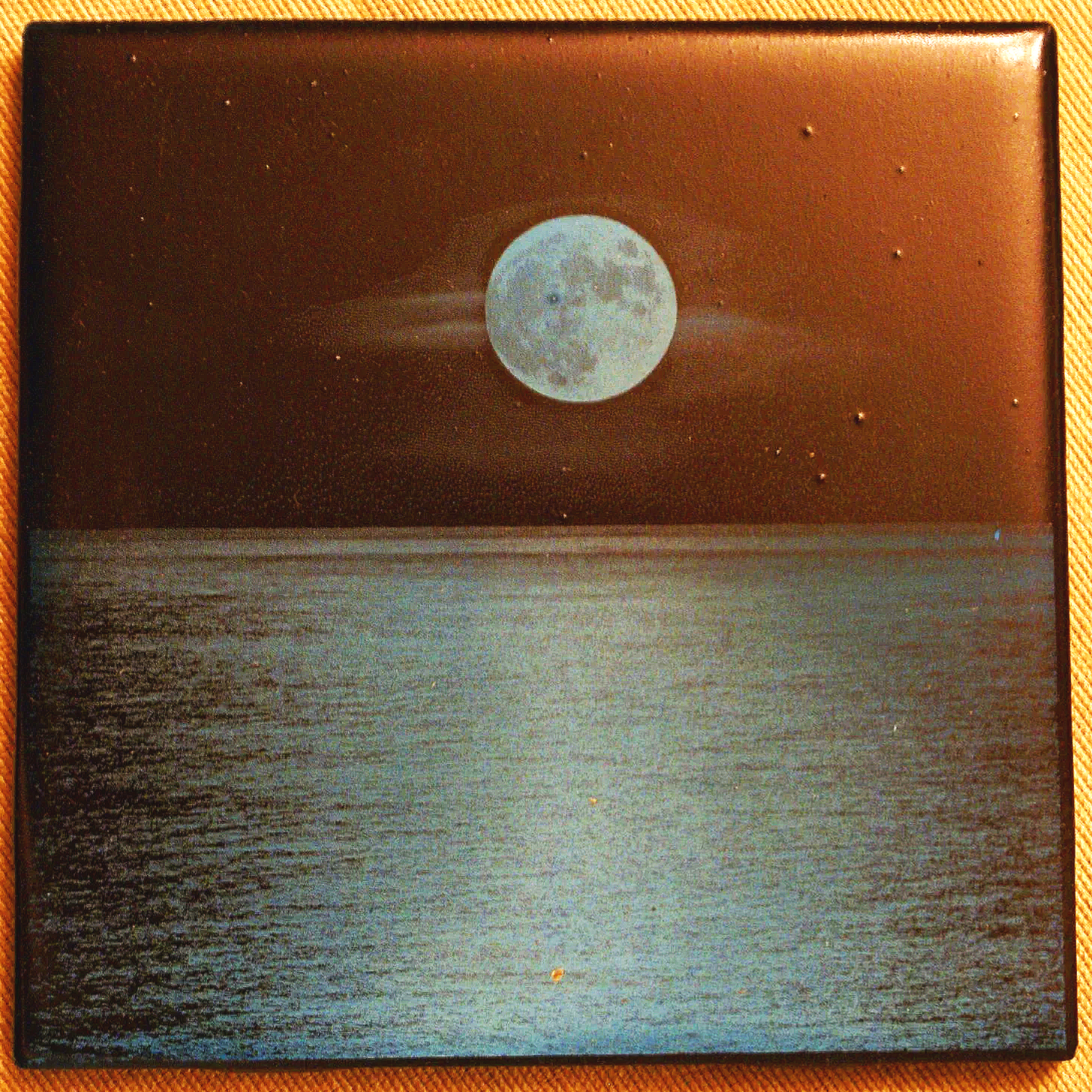 A painting of a full moon over a water body at night, with stars in the sky.