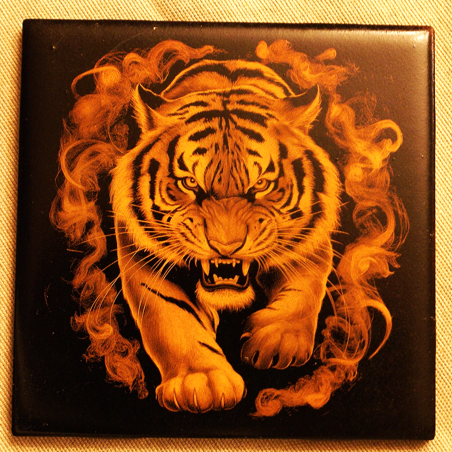 Artwork of a fierce tiger with glowing orange fur, black stripes, and intense eyes, surrounded by swirling flames in a stylized design.