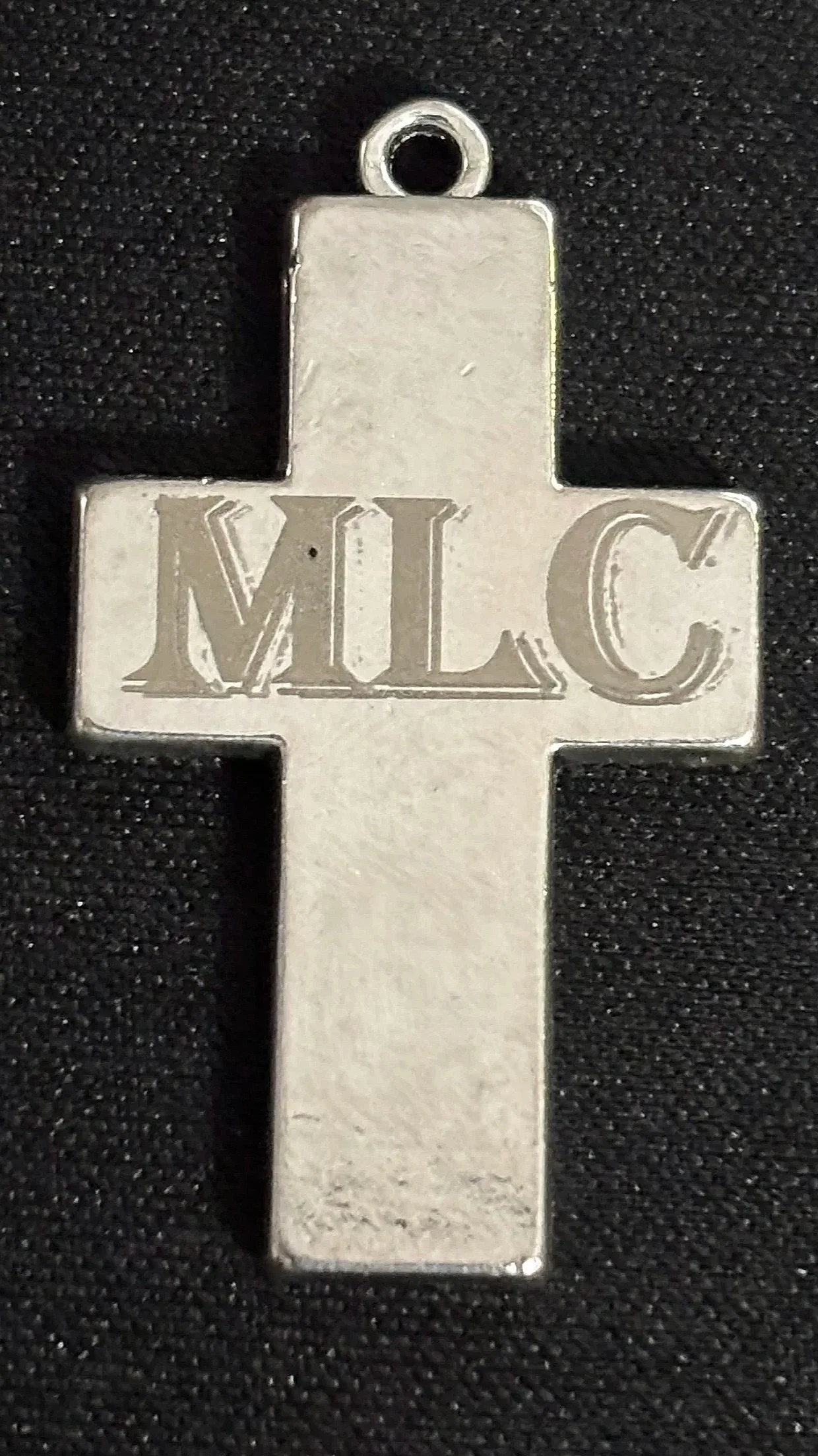 This custom-engraved cross was created to honor a loved one whose presence still guides and inspires