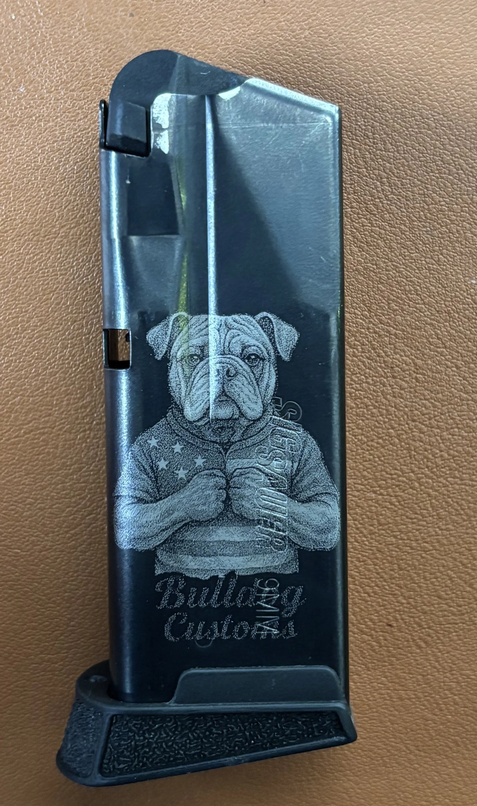 A custom‑engraved magazine featuring our signature Bulldog artwork—bold lines, crisp detail, and unmistakable Bulldog Customs style.