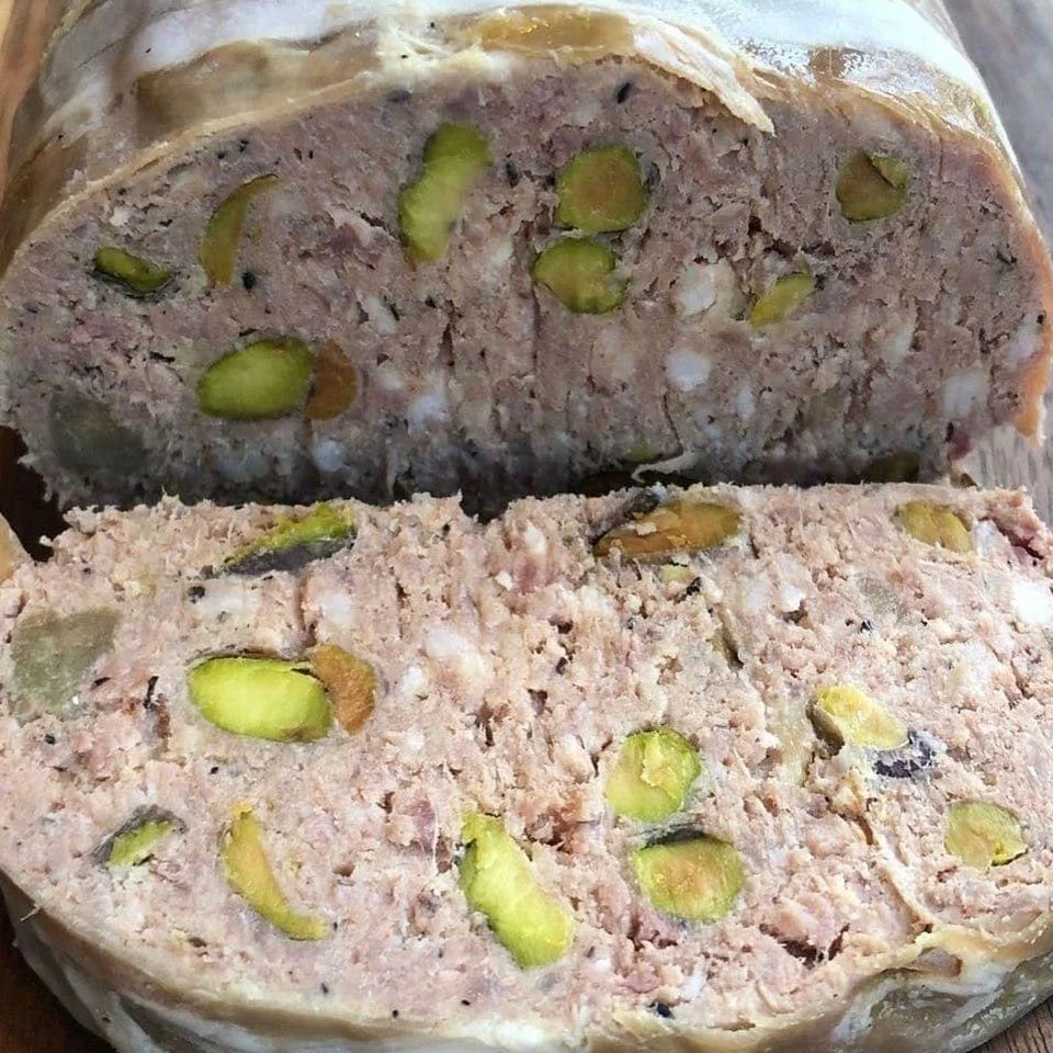 Rabbit &amp; Pistachio Terrine wrapped in delicate pork caul fat.

A timeless French classic &mdash; rustic, elegant, and bursting with flavor. Handcrafted in small batches for true epicureans. 🇫🇷✨