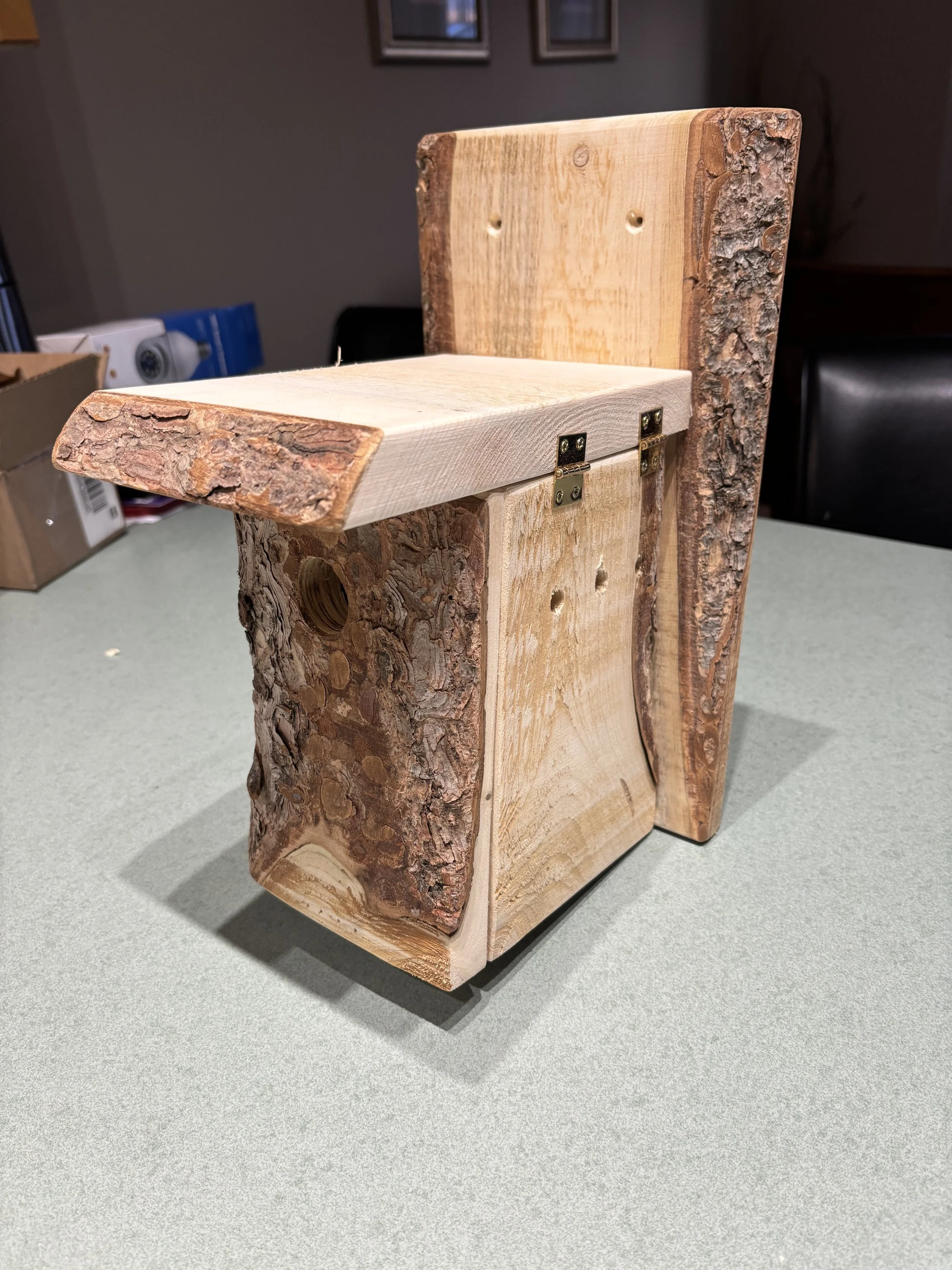 Ohhh my nest boxes made by The Bearded Woodsman!  Every one of my boxes have been occupied - I'm sure because of the amazing craftsmanship and attention to detail/specs that Micah puts into them.