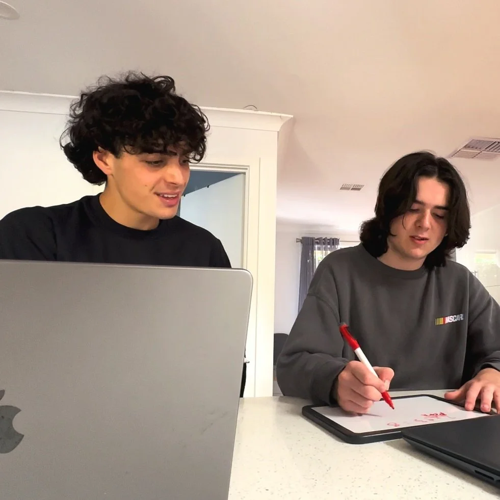 Tutor Aidan running a one-on-one lesson with a Year 9 student at home