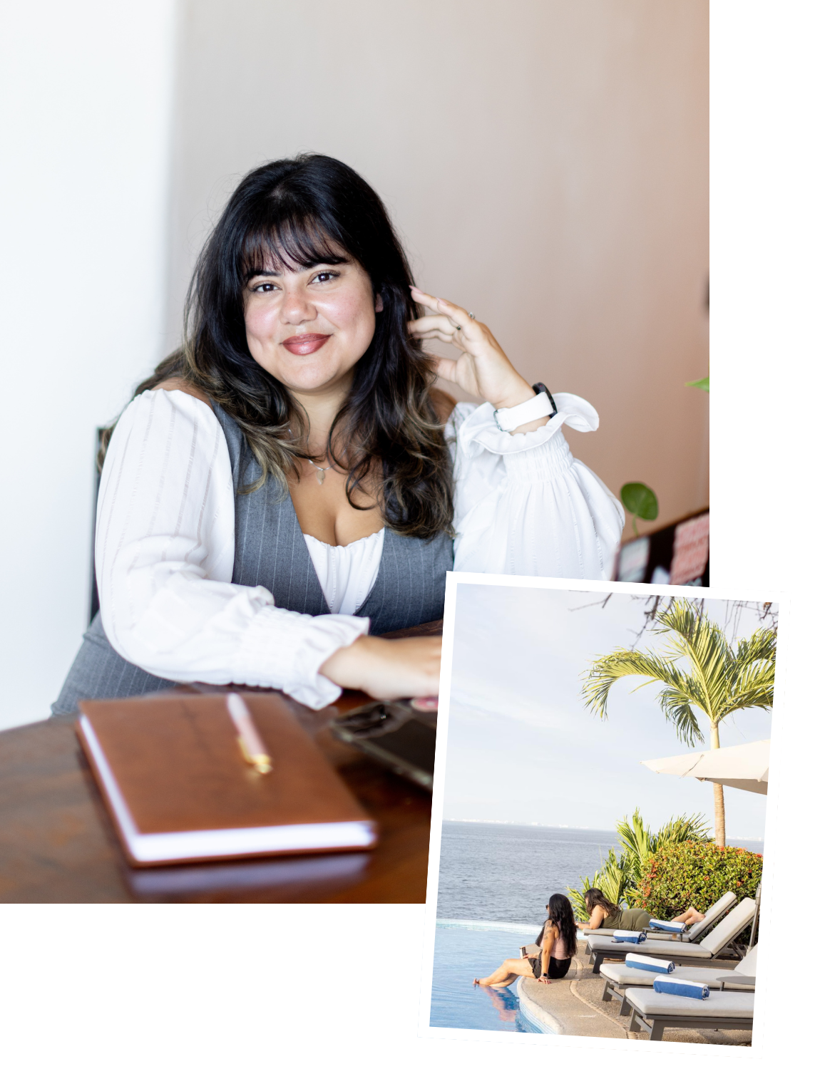 A woman with dark hair and bangs smiling at the camera, sitting at a desk with a notebook and a laptop. There are tropical vacation photos on the desk, showing a person sitting by a pool with palm trees and the ocean in the background.