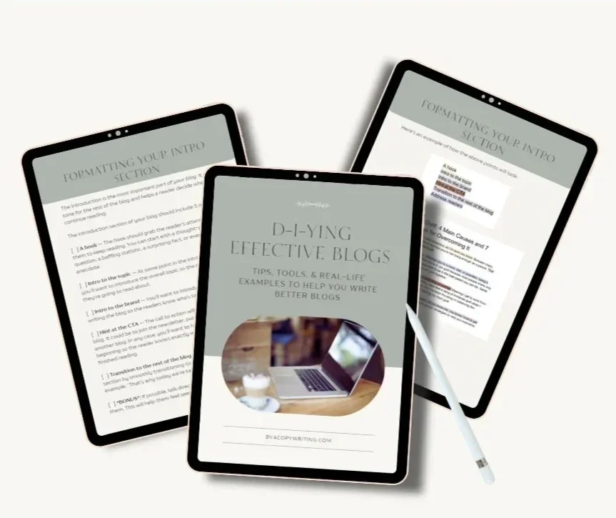 Three tablets displaying a blog about writing effective blogs with tips and examples, one tablet with a stylus, placed on a plain white surface.