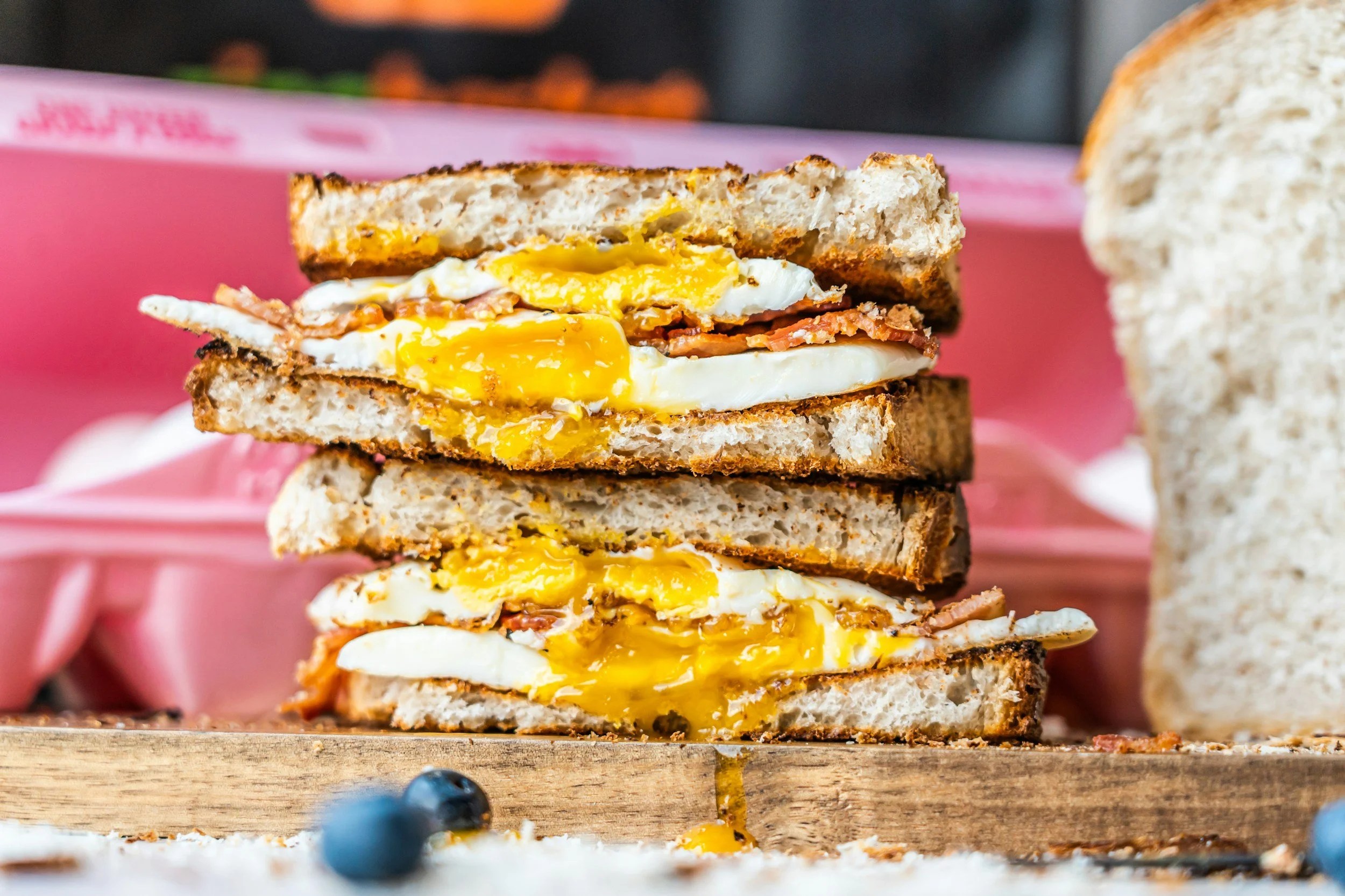 Enjoy our classic Bacon, Egg & Cheese breakfast sandwich, or choose the Avocado & Egg White option layered with fresh avocado, tomato, and spinach. For larger gatherings, our Breakfast Buffet features bacon, sausage, fluffy scrambled eggs, and season