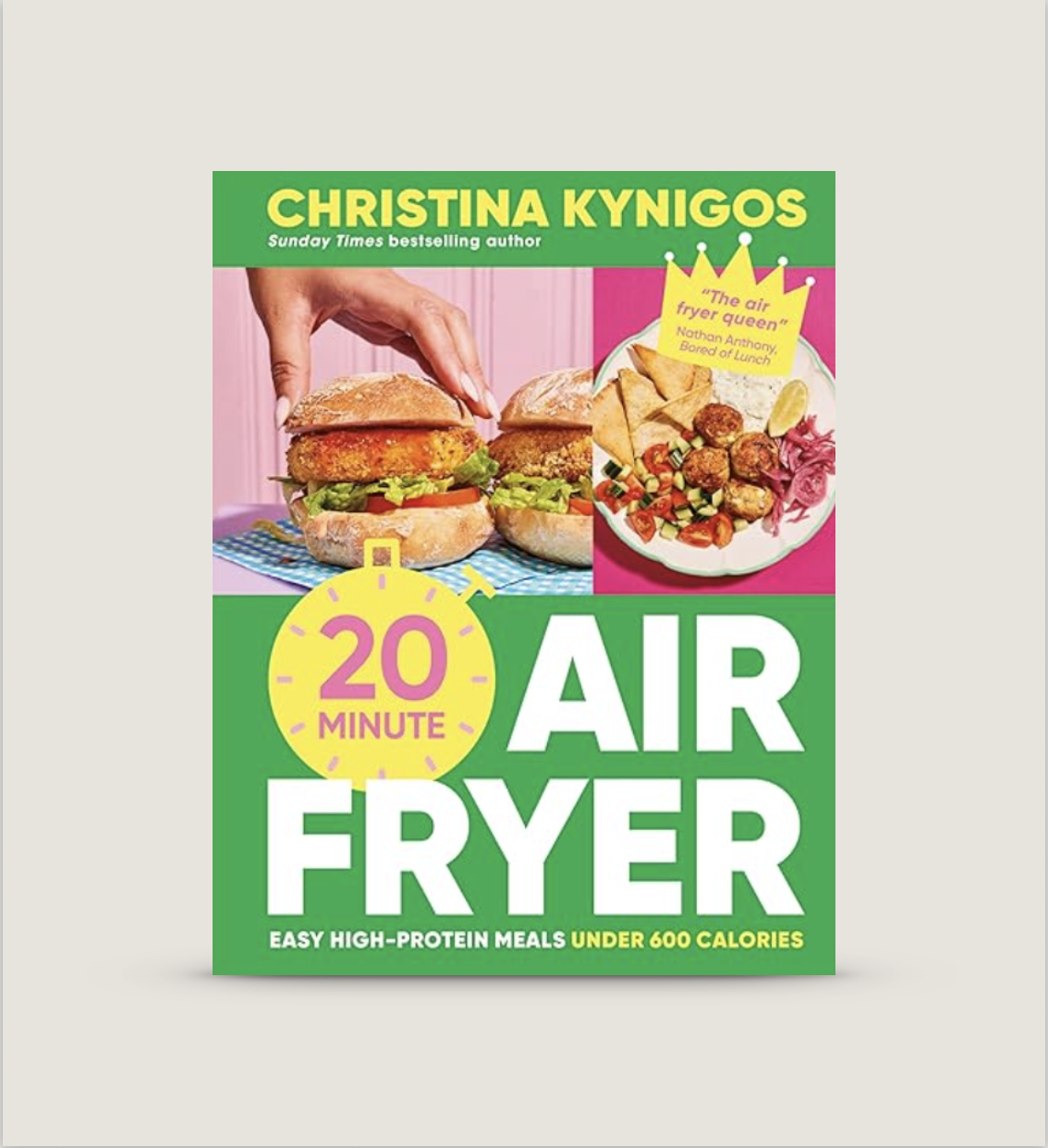 Book cover titled '20 Minute Air Fryer' by Christina Kynigos. Features images of a sandwich with a chicken patty and a plate of fried food with vegetables.