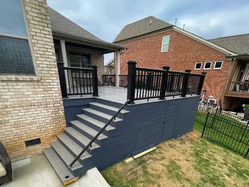 After picture showcasing a TimberTech Deckwith new composite decking and black composite railings built by Deck Craft in Spring Hill, Tennessee