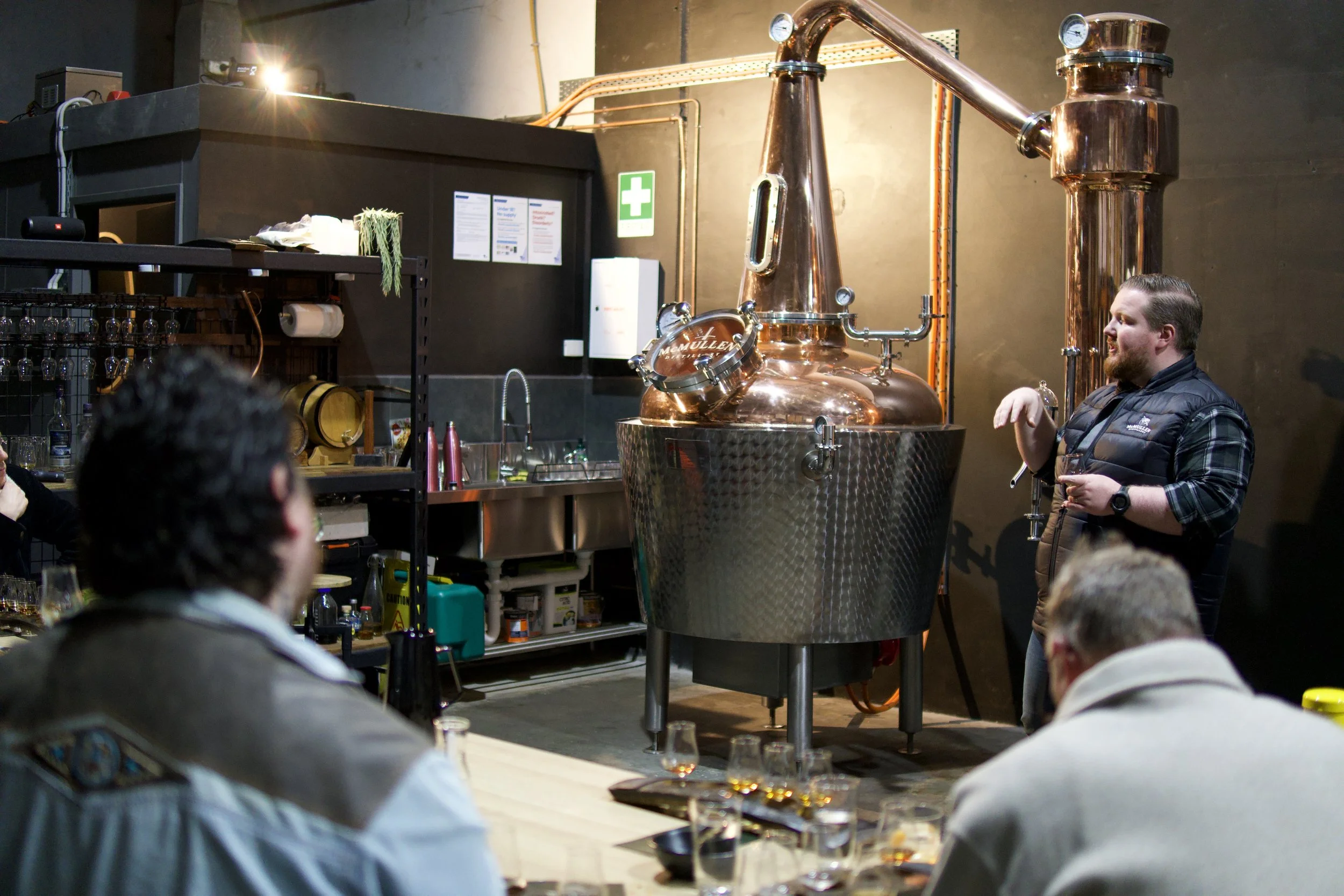 A couple sharing a whisky together. 